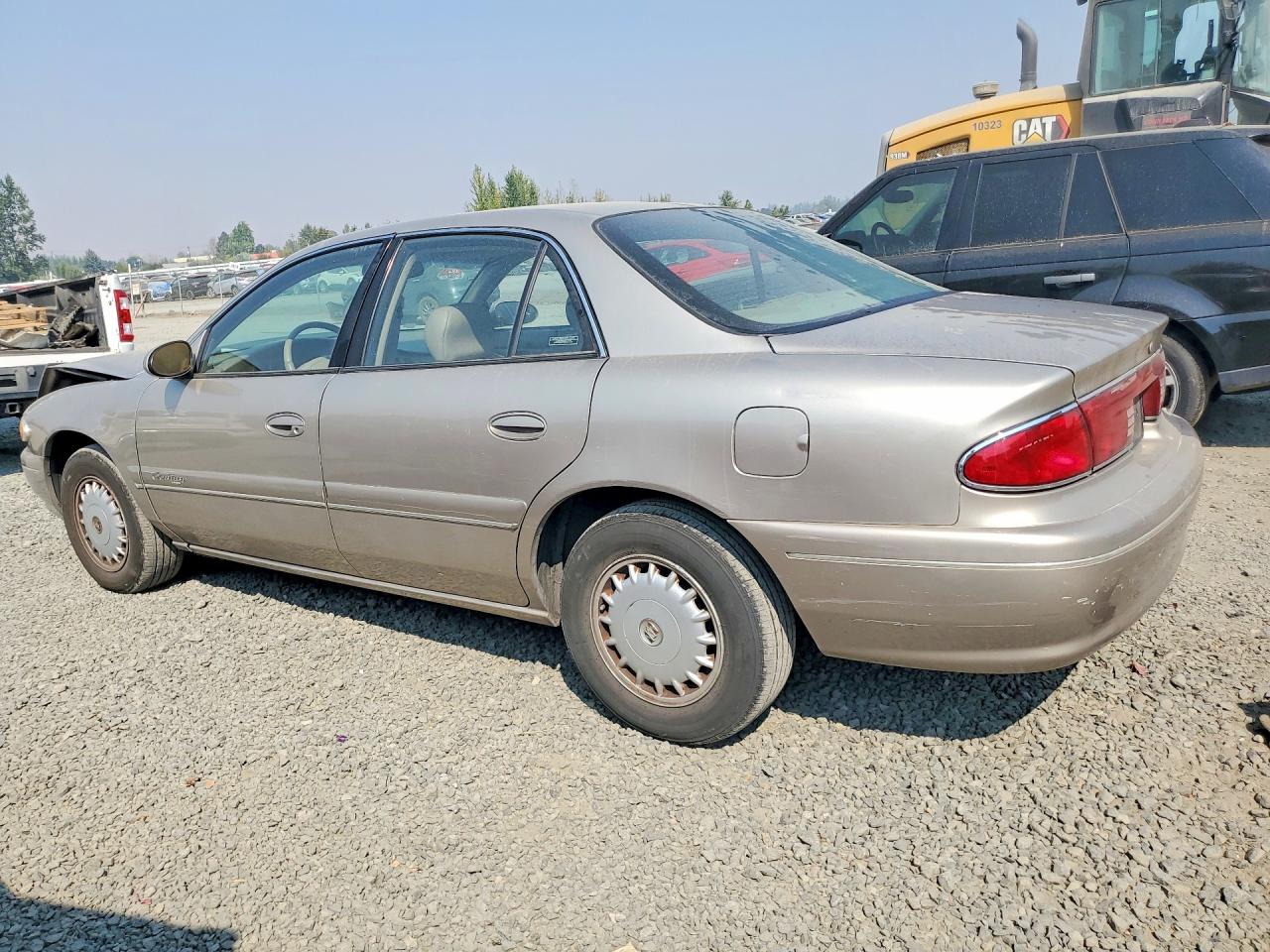 1999 Buick Century Limited Tan vin: 2G4WY52M7X1456216