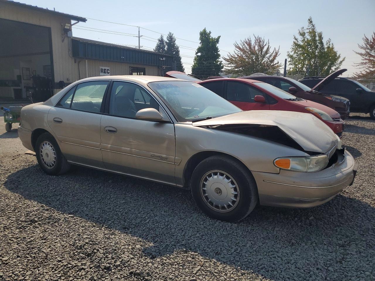 1999 Buick Century Limited Tan vin: 2G4WY52M7X1456216