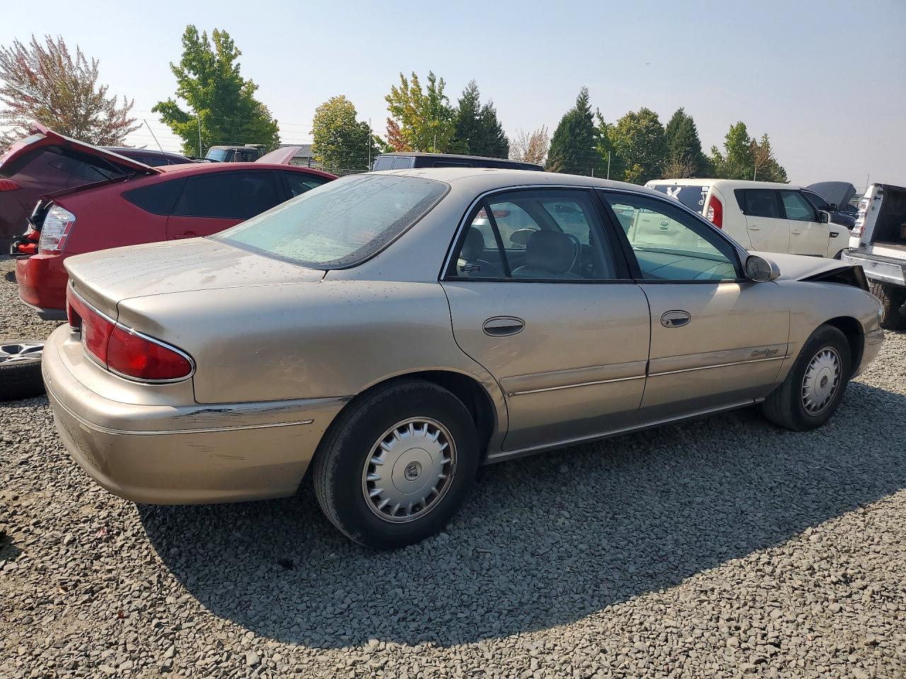 1999 Buick Century Limited Tan vin: 2G4WY52M7X1456216