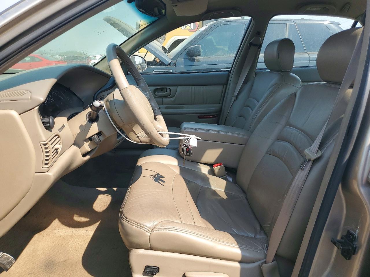 1999 Buick Century Limited Tan vin: 2G4WY52M7X1456216