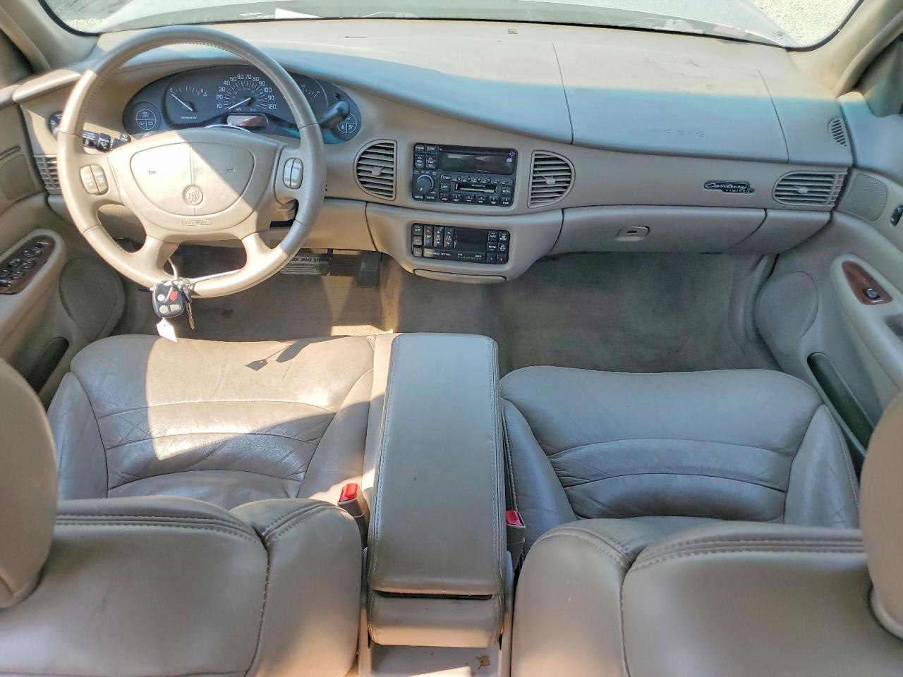 1999 Buick Century Limited Tan vin: 2G4WY52M7X1456216