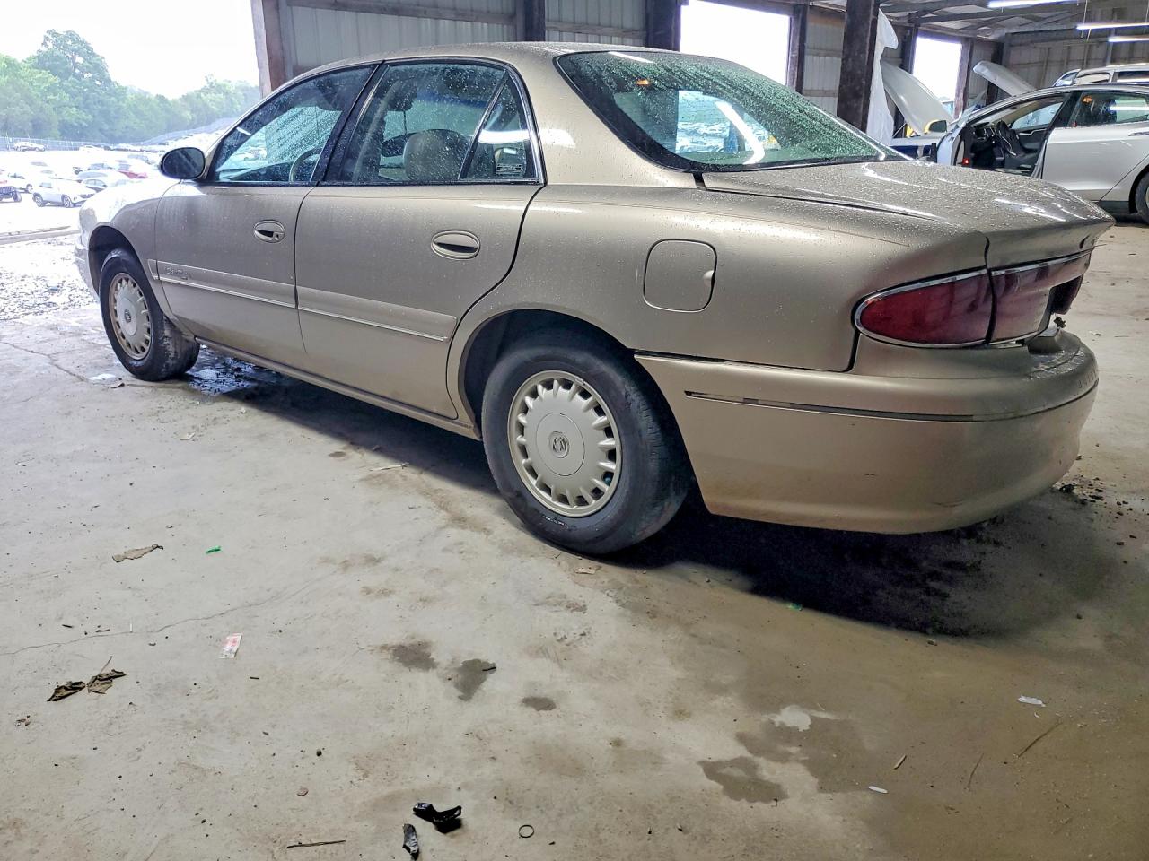 1999 Buick Century Limited Beige vin: 2G4WY52M8X1618936