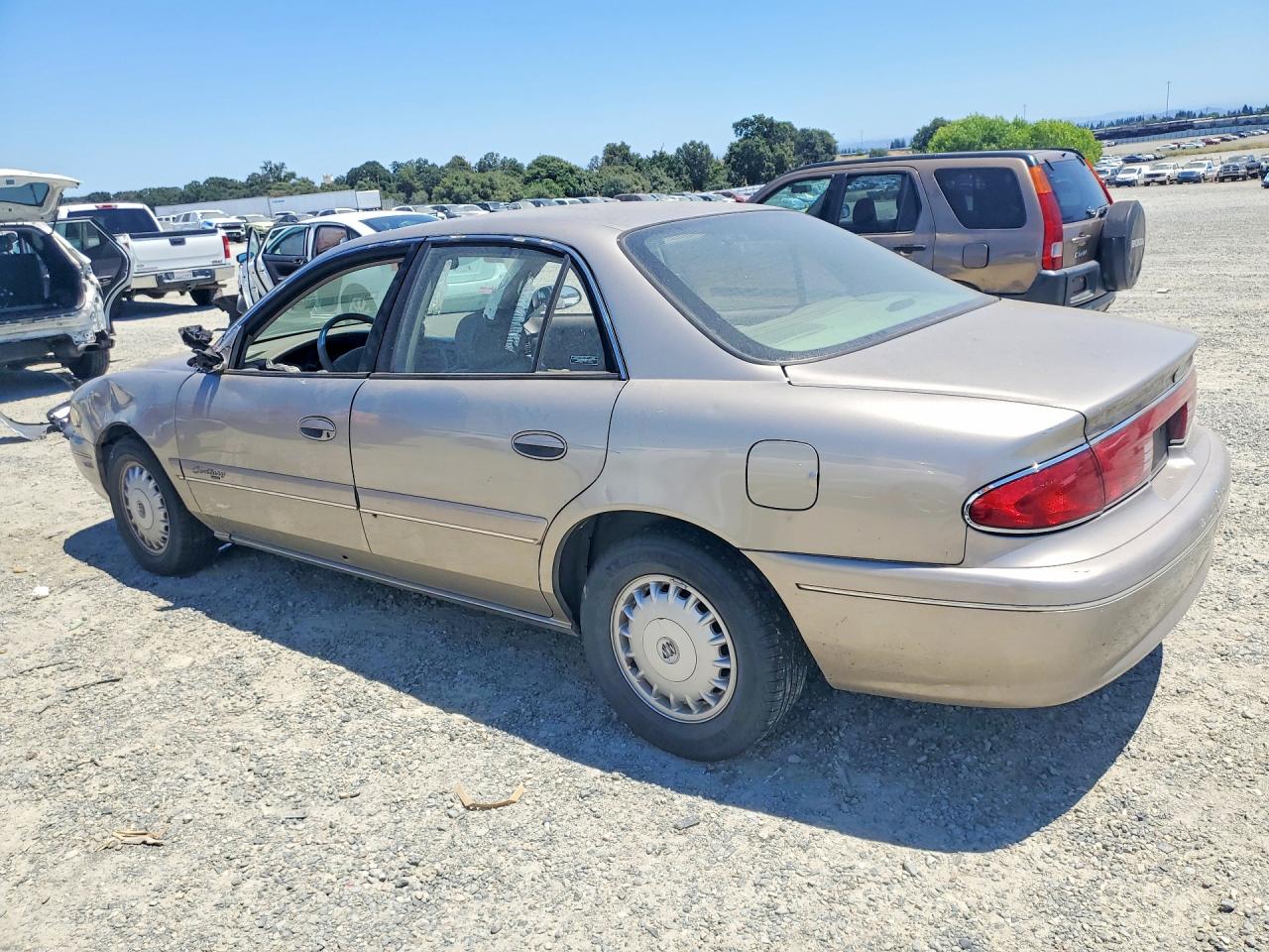 1999 Buick Century Limited Tan vin: 2G4WY52M9X1540621