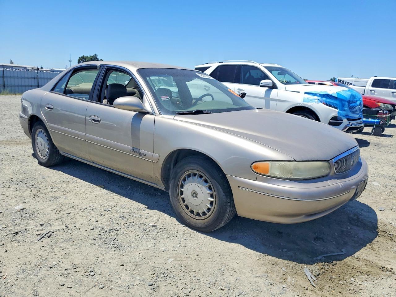 1999 Buick Century Limited Tan vin: 2G4WY52M9X1540621