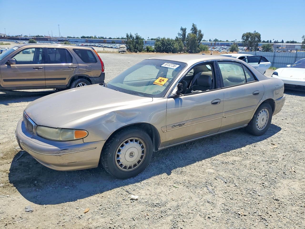 1999 Buick Century Limited Tan vin: 2G4WY52M9X1540621