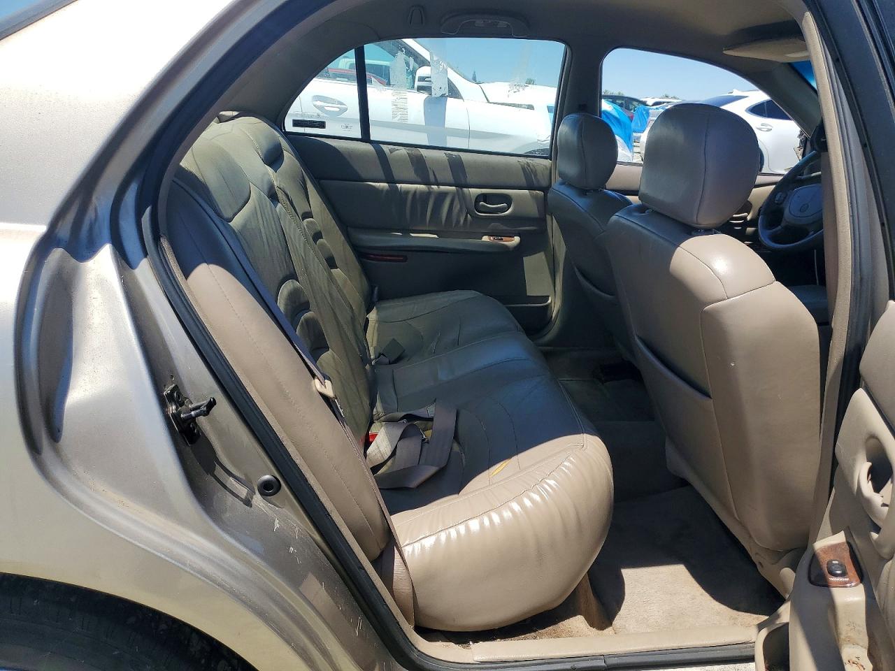 1999 Buick Century Limited Tan vin: 2G4WY52M9X1540621