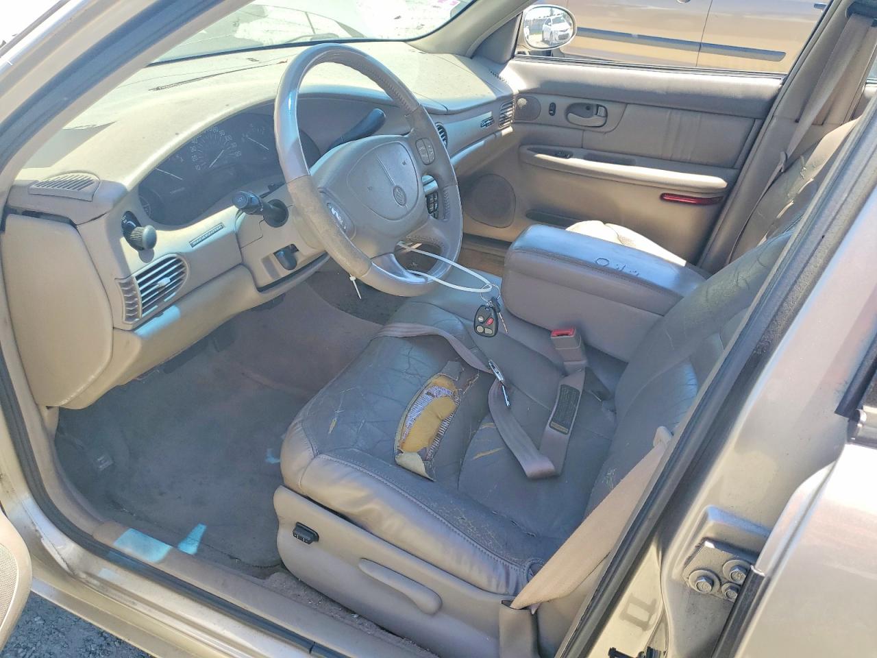 1999 Buick Century Limited Tan vin: 2G4WY52M9X1540621