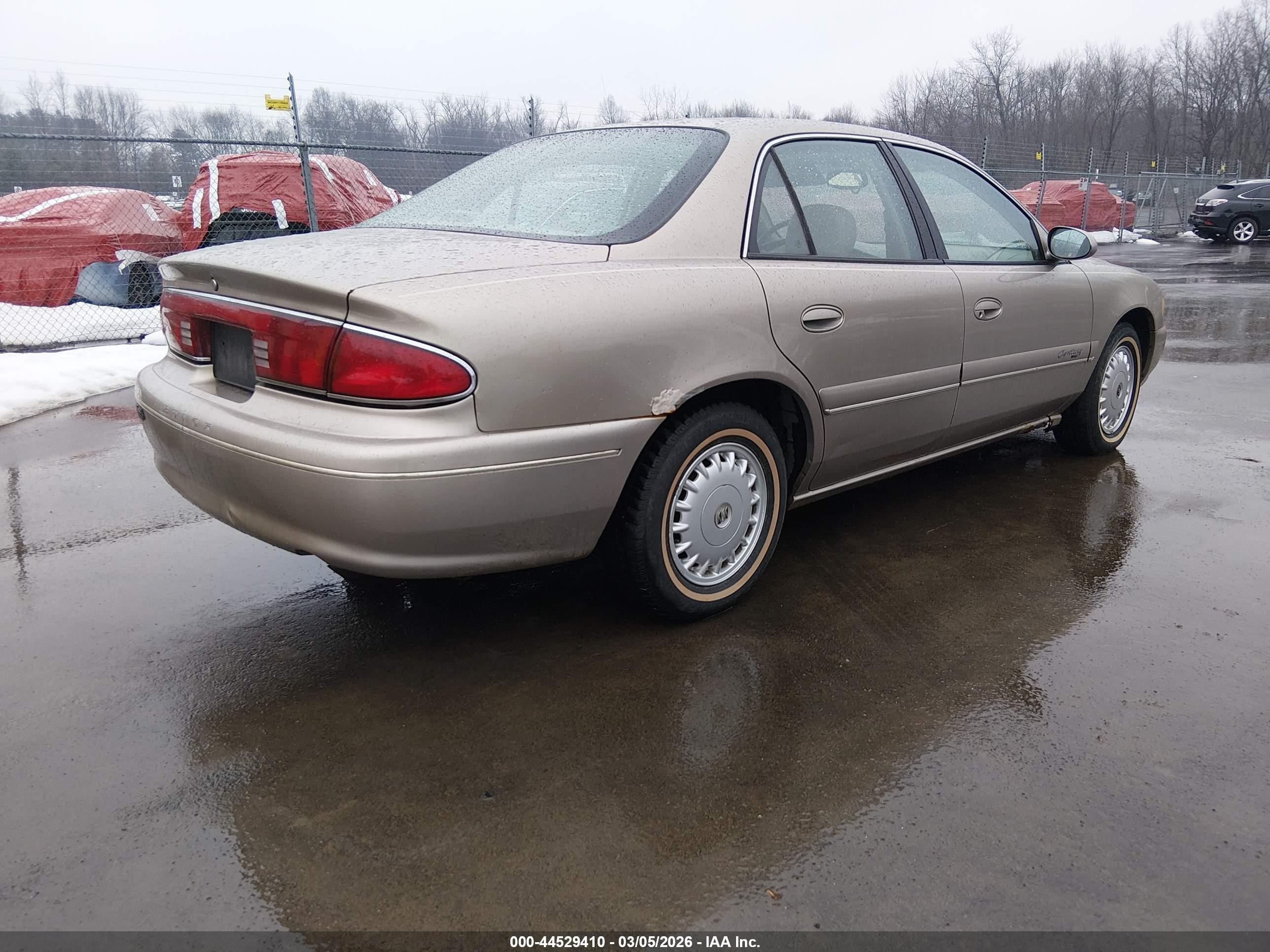1999 Buick Century Limited Gold vin: 2G4WY52MXX1567150