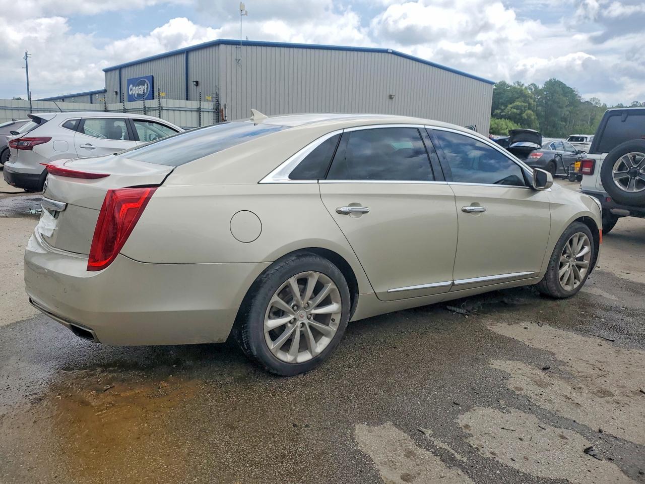 2014 Cadillac Xts Luxury Collection Золотой vin: 2G61M5S33E9215577