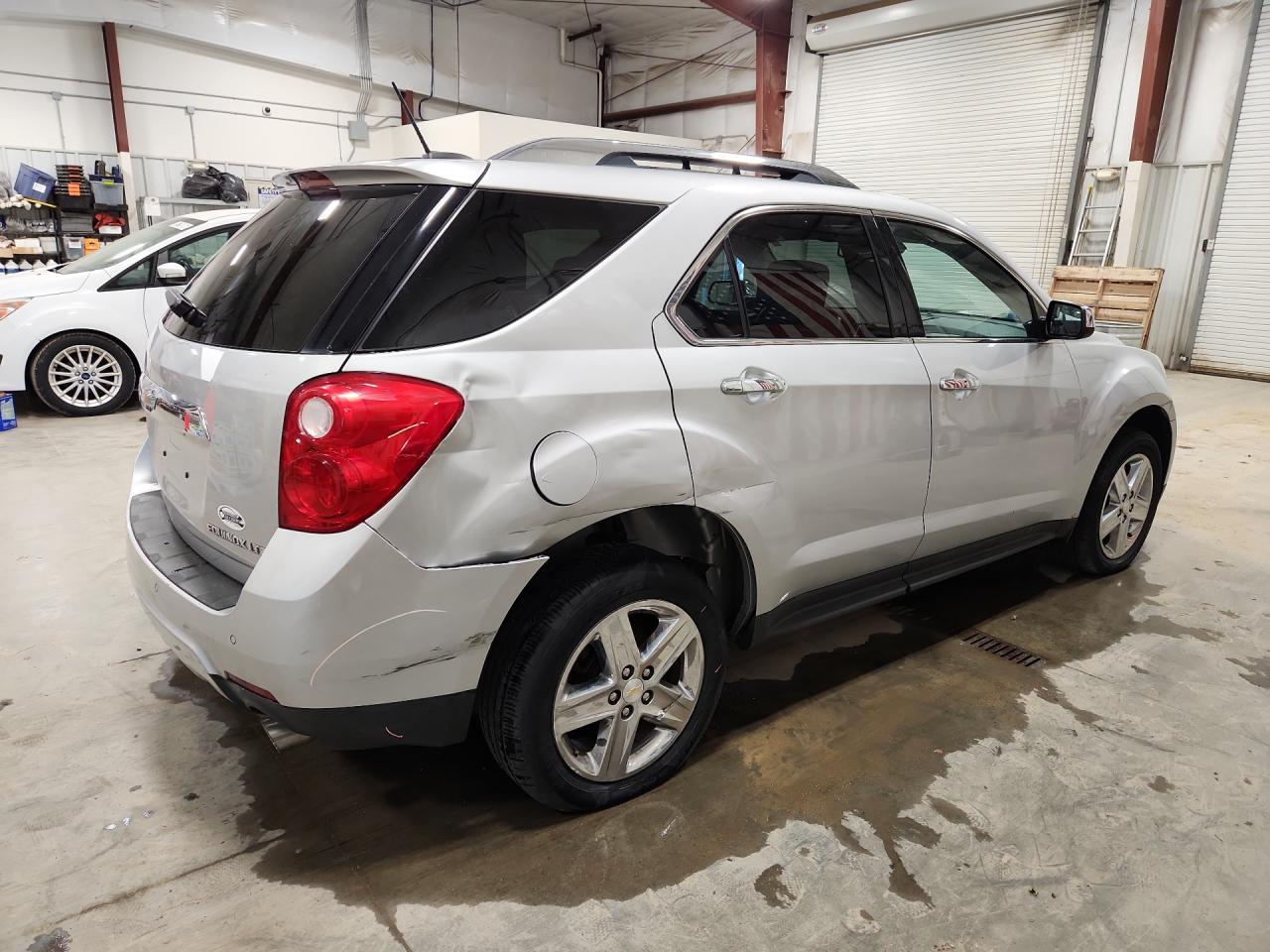 2015 Chevrolet Equinox Silver vin: 2GNFLHE33F6398461 Damage: Right Qtr Panel, Dent(S) W/ Paint Dmg, > 12 Inches