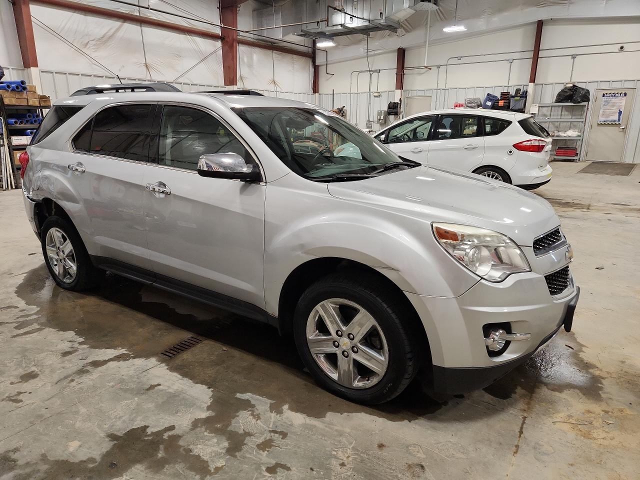 2015 Chevrolet Equinox Silver vin: 2GNFLHE33F6398461 Damage: Right Front Fender, Dent(S) W/ Paint Dmg, 6 To 7 Inches