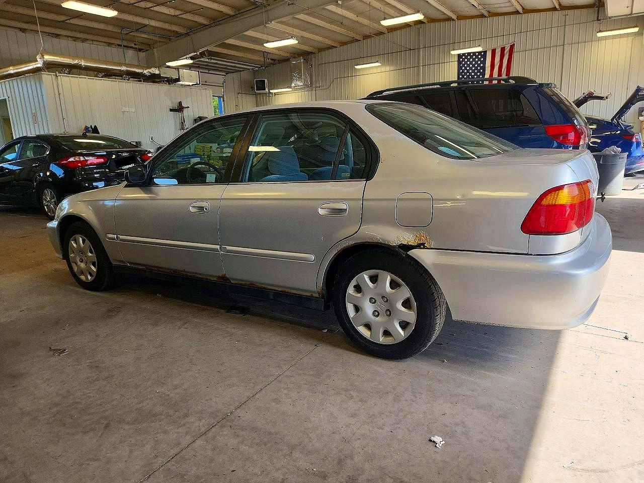 1999 Honda Civic Base Серебряный vin: 2HGEJ6610XH595591