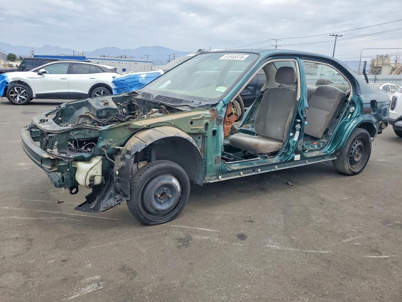 1999 Honda Civic Base Teal vin: 2HGEJ6617XH511525