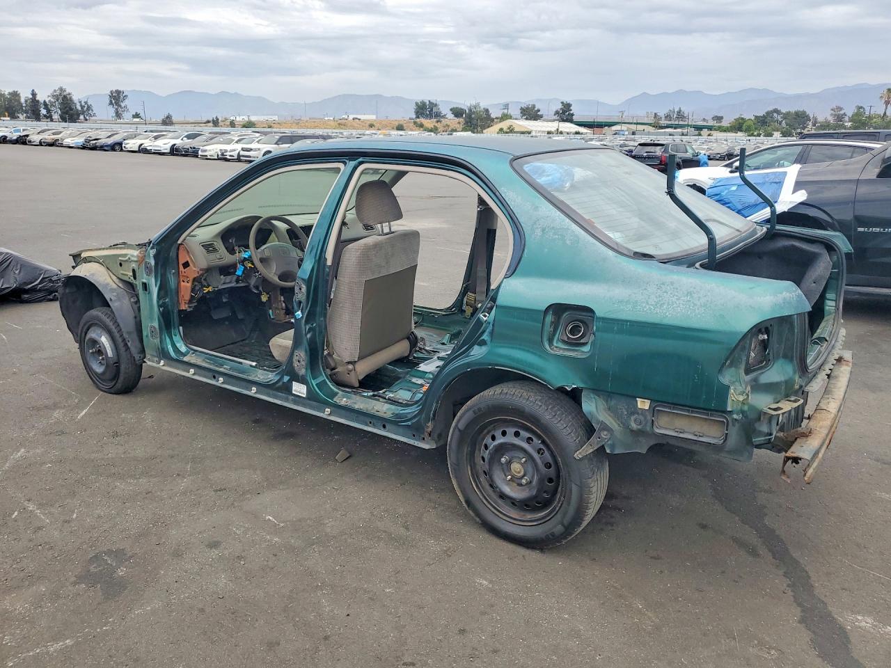 1999 Honda Civic Base Teal vin: 2HGEJ6617XH511525