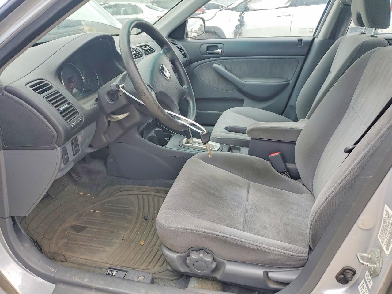 2003 Honda Civic 4d Серебряный vin: 2HGES16503H589545