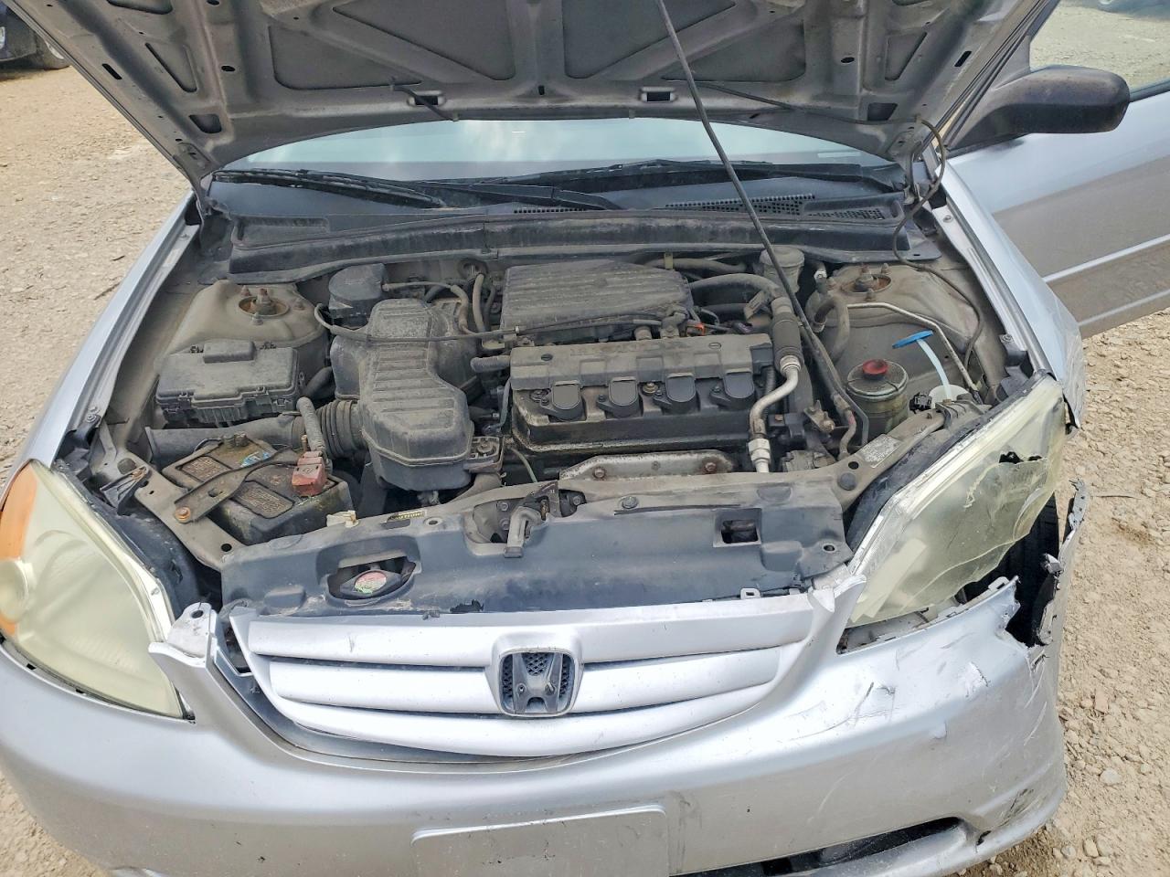 2003 Honda Civic 4d Серебряный vin: 2HGES16503H589545