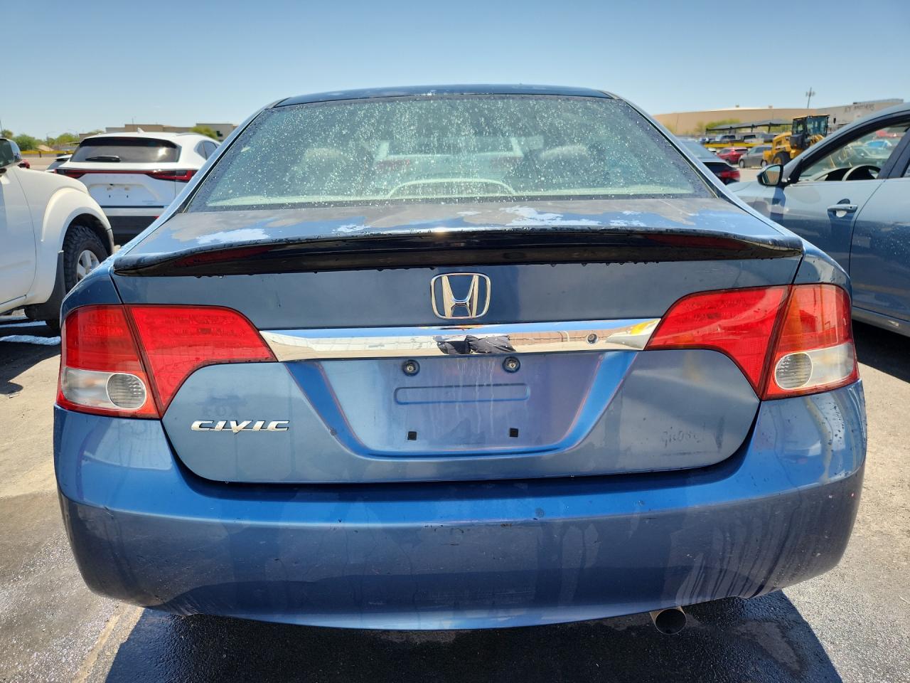 2010 Honda Civic Blue vin: 2HGFA1F5XAH560512 Damage: Deck Lid, Oxidized, > 12 Inches
