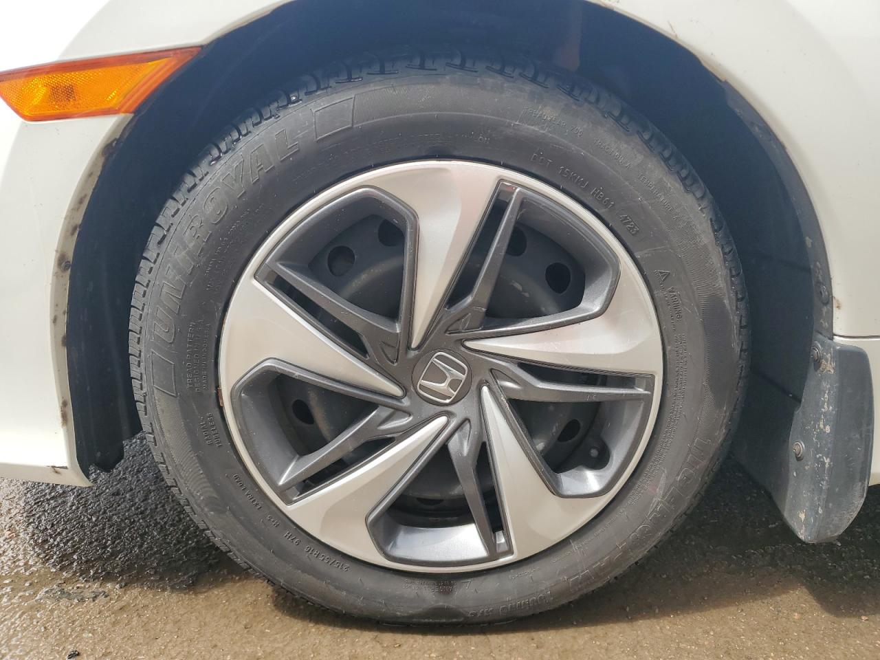 2021 Honda Civic Lx White vin: 2HGFC2F59MH017107 Damage: Left Front Wheel, Multiple Scratches Light, 4