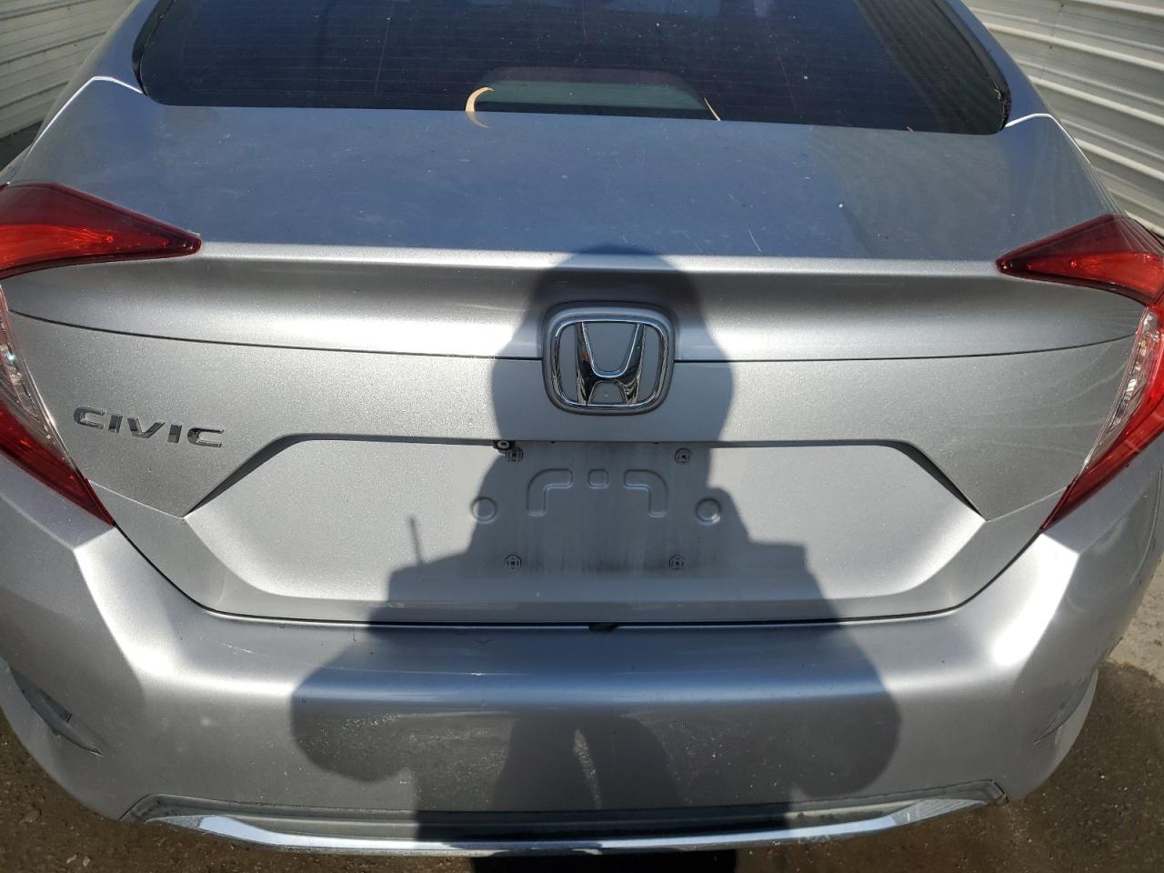 2019 Honda Civic Lx Silver vin: 2HGFC2F61KH540367 Damage: Deck Lid, Heavy Scratch, 2 To 3 Inches