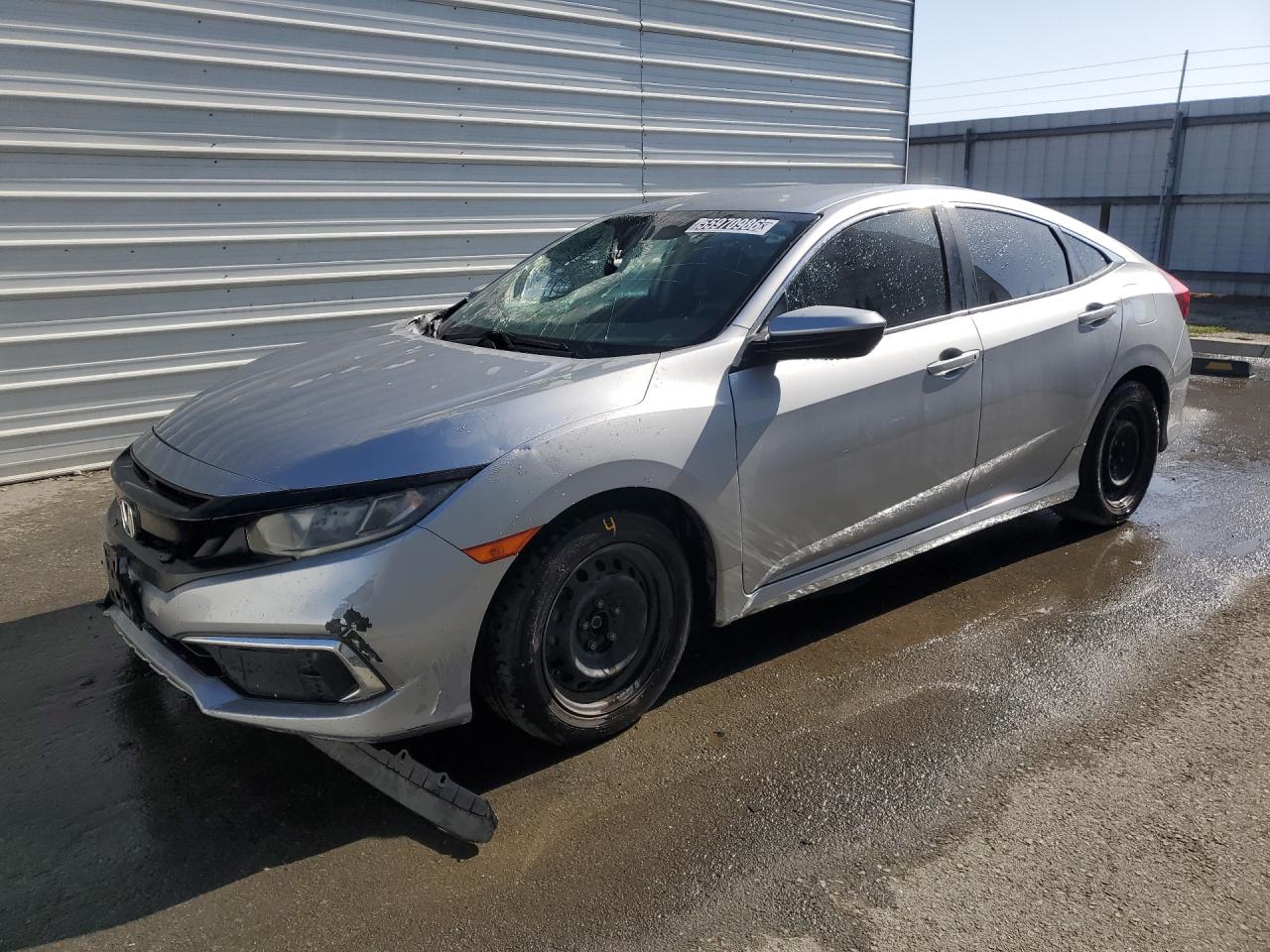2019 Honda Civic Lx Silver vin: 2HGFC2F61KH540367 Damage: Left Front Fender, Dent(S) W/ Paint Dmg, 2 To 3 Inches