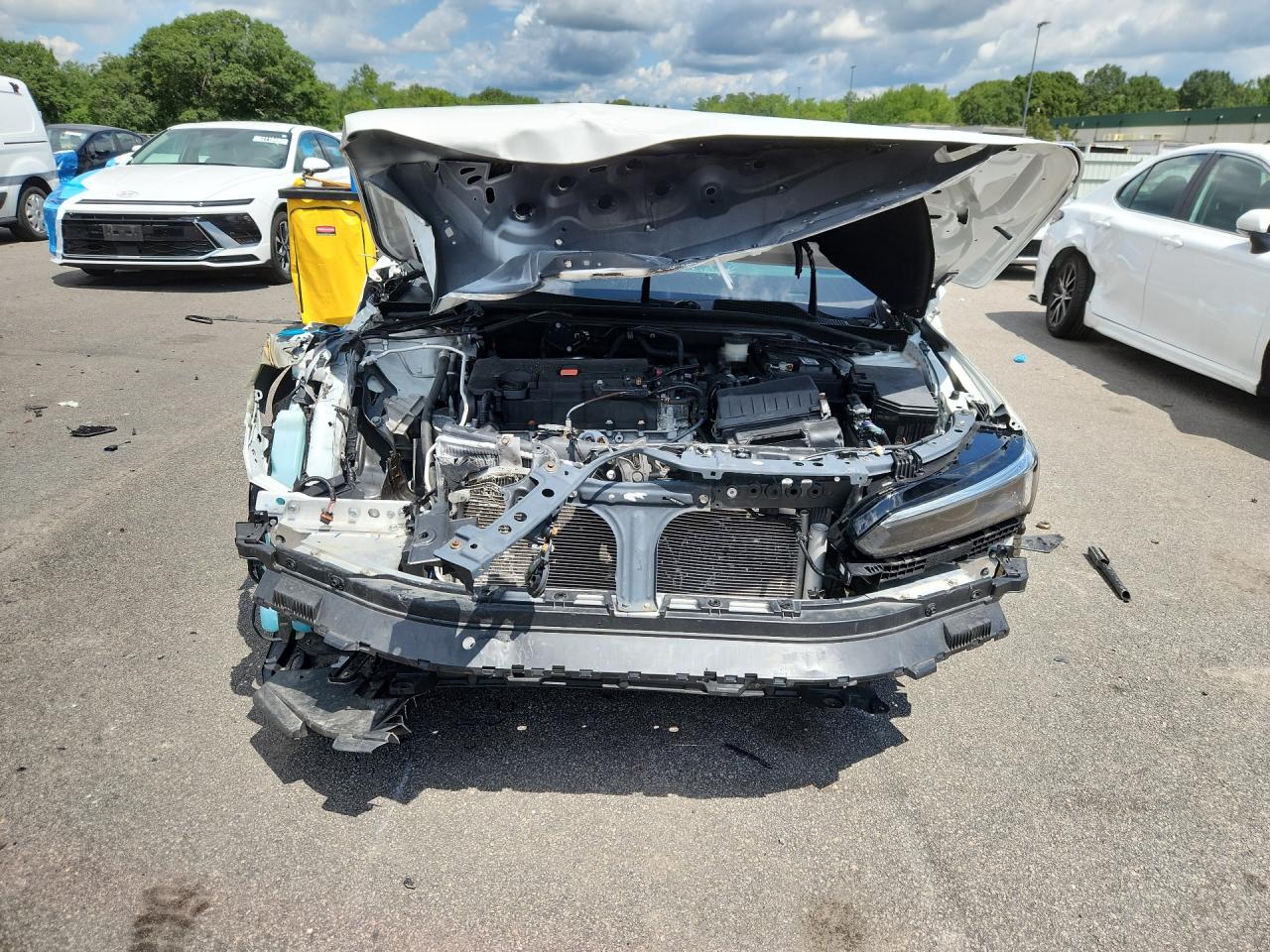 2023 Honda Civic Sport White vin: 2HGFE2F52PH542878 Damage: Right Head Lamp, Missing, Replacement Required