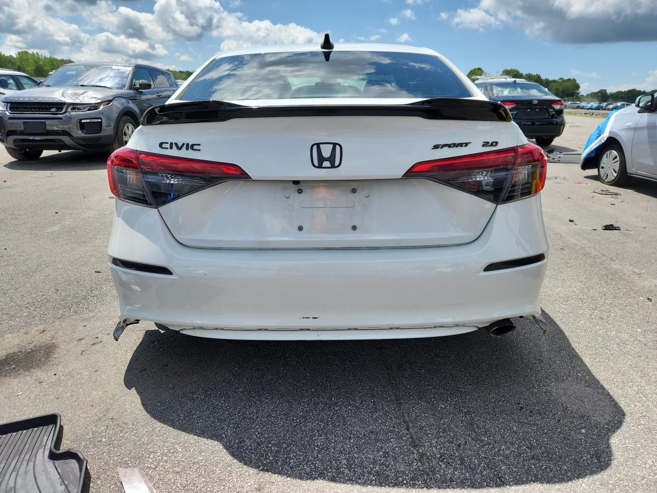 2023 Honda Civic Sport White vin: 2HGFE2F52PH542878 Damage: Rear Bumper, Heavy Scratch, 1 To 2 Inches