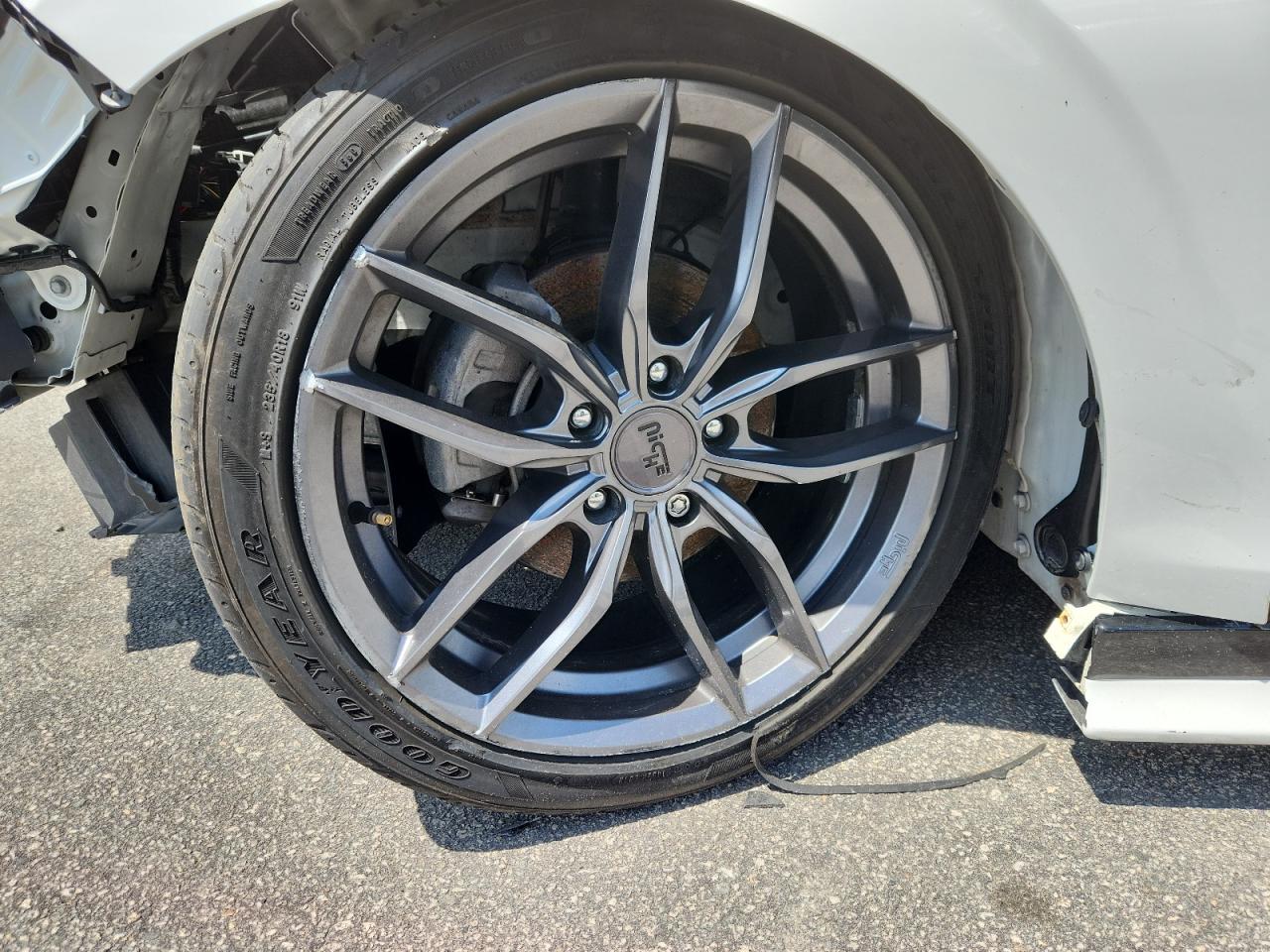 2023 Honda Civic Sport White vin: 2HGFE2F52PH542878 Damage: Left Rear Wheel, Curb Rash, > 12 Inches