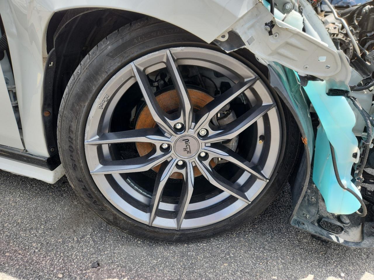 2023 Honda Civic Sport White vin: 2HGFE2F52PH542878 Damage: Right Front Wheel, Curb Rash, 6 To 7 Inches