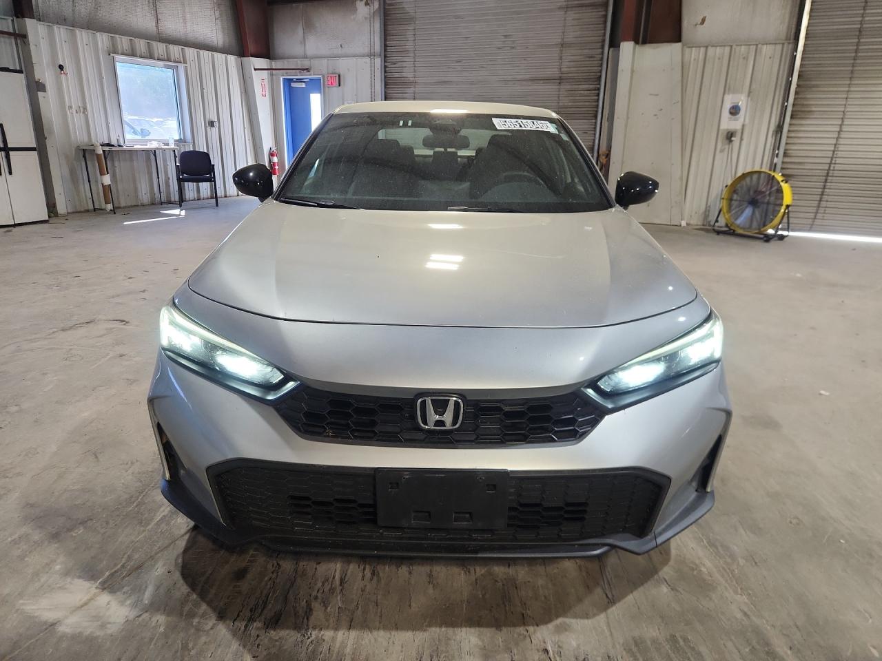 2025 Honda Civic Sport Silver vin: 2HGFE2F55SH604153 Damage: Front Bumper, Heavy Scratch, 1 To 2 Inches