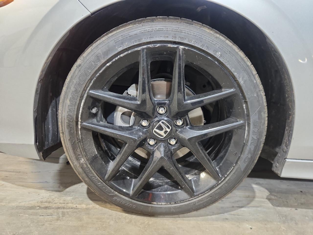 2025 Honda Civic Sport Silver vin: 2HGFE2F55SH604153 Damage: Left Front Wheel, Curb Rash, > 12 Inches