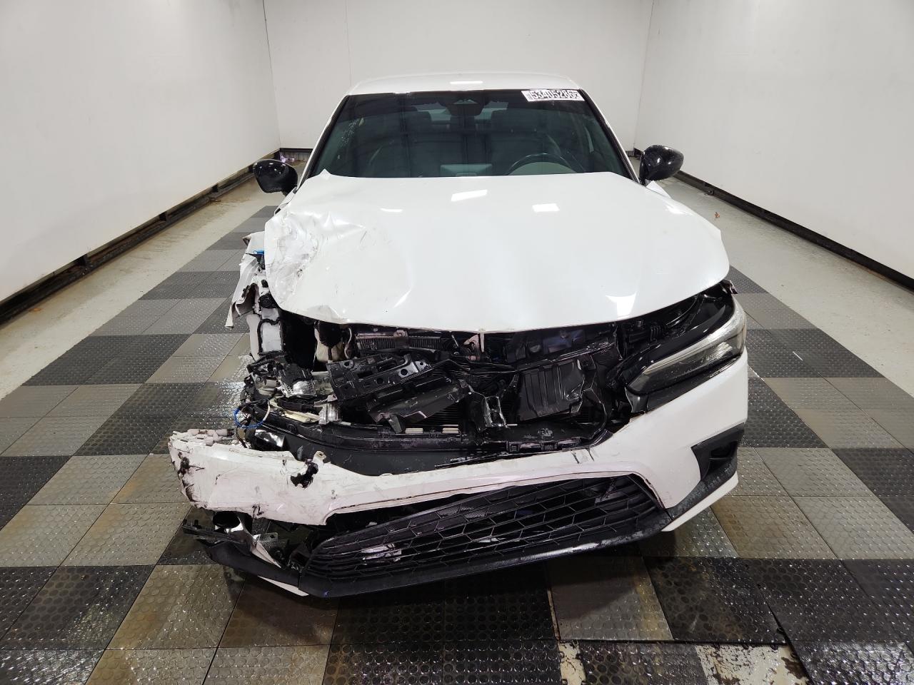 2022 Honda Civic Sport White vin: 2HGFE2F57NH517522 Damage: Front Bumper Molding, Broken, Replacement Required