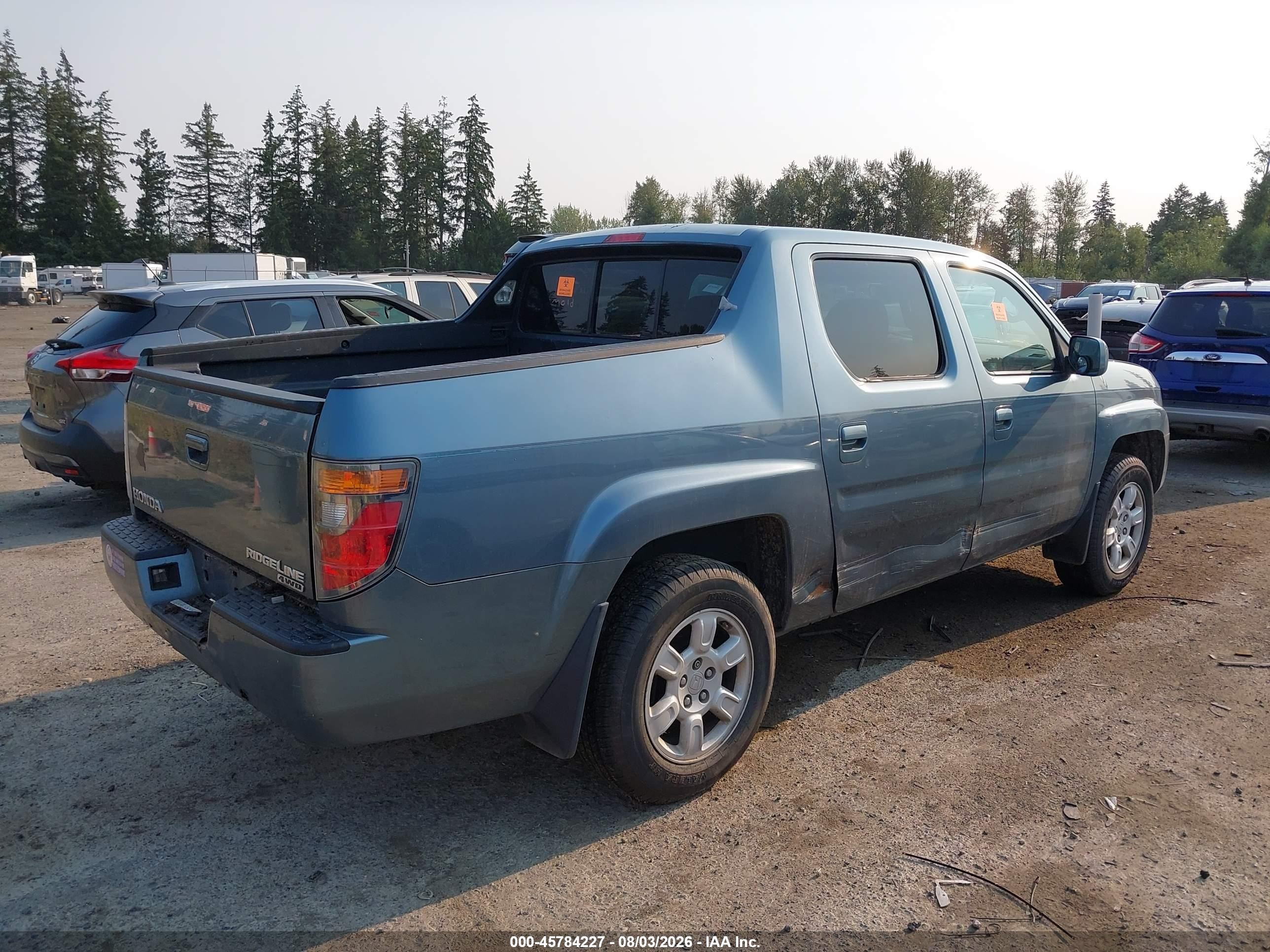 2006 Honda Ridgeline Rtl Blue vin: 2HJYK16556H556102
