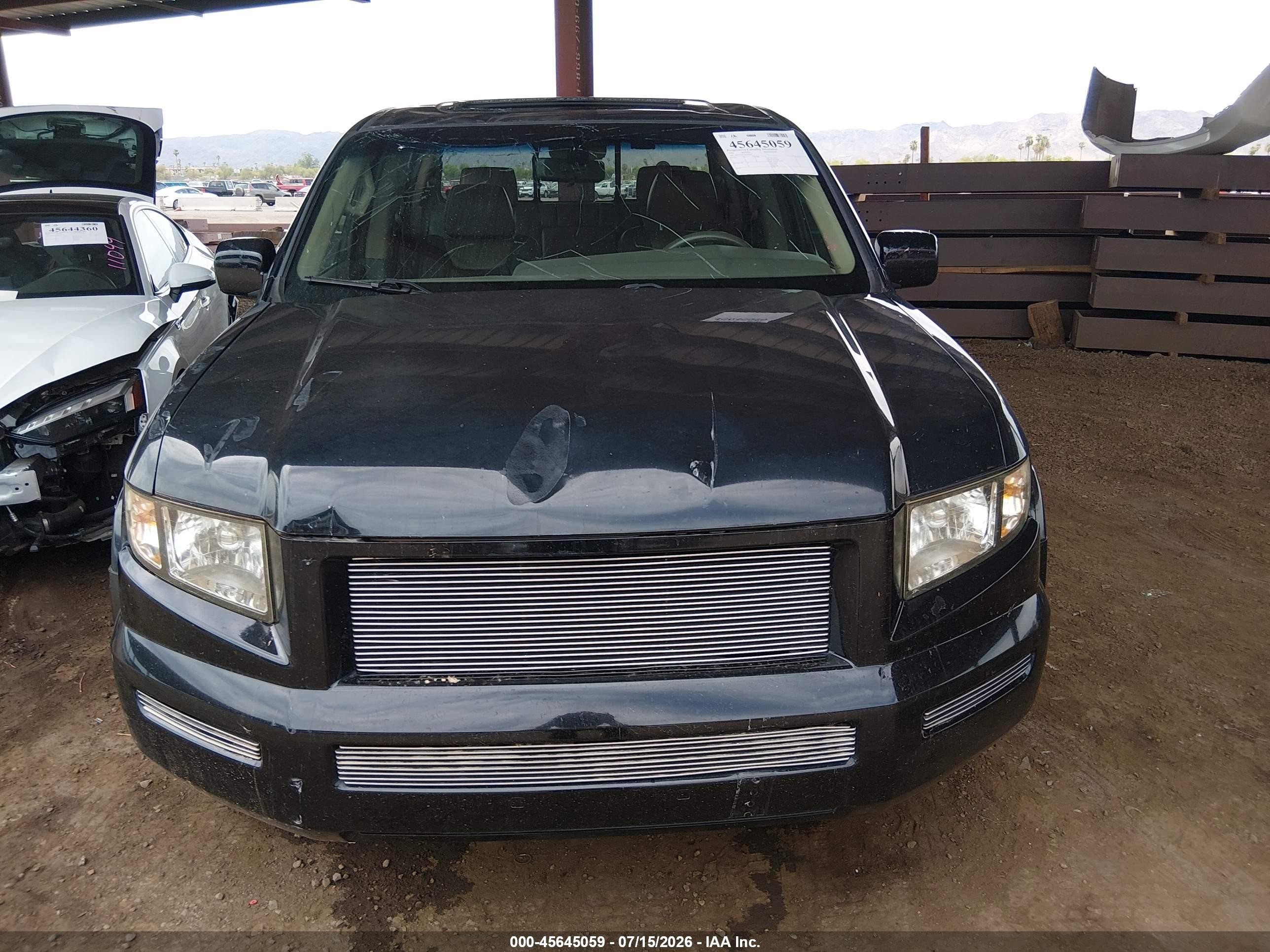2006 Honda Ridgeline Rtl Black vin: 2HJYK16576H552228