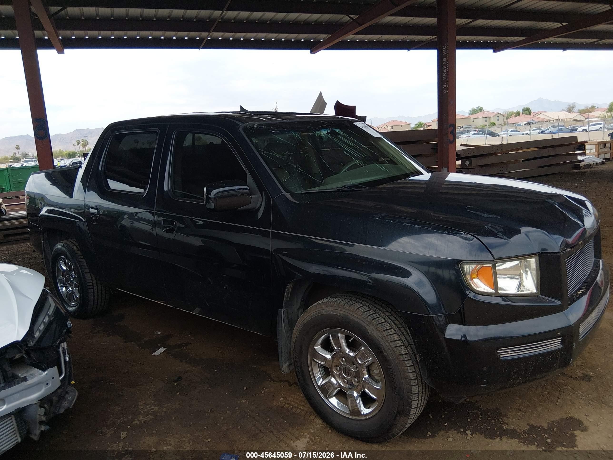 2006 Honda Ridgeline Rtl Black vin: 2HJYK16576H552228