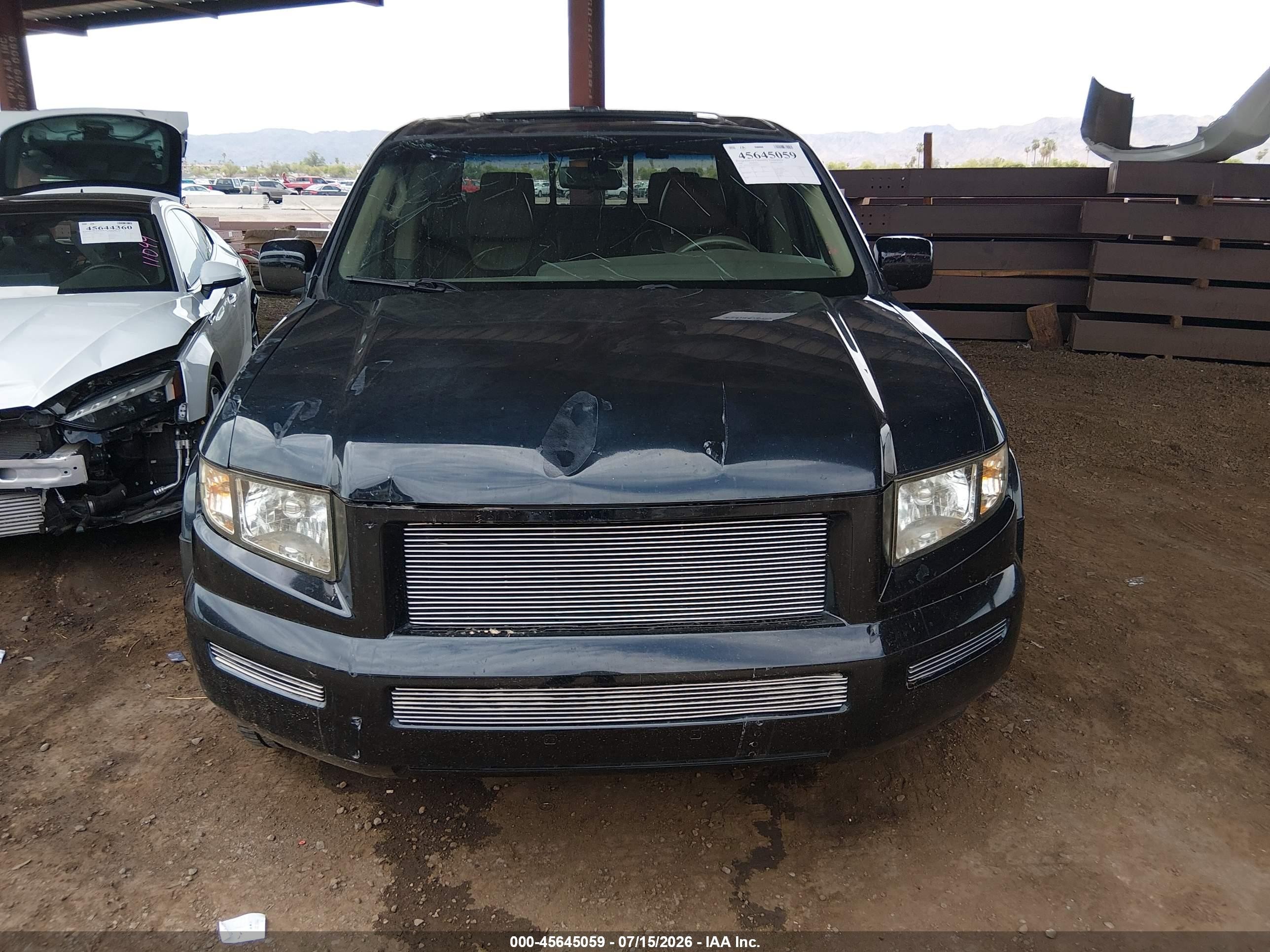 2006 Honda Ridgeline Rtl Black vin: 2HJYK16576H552228