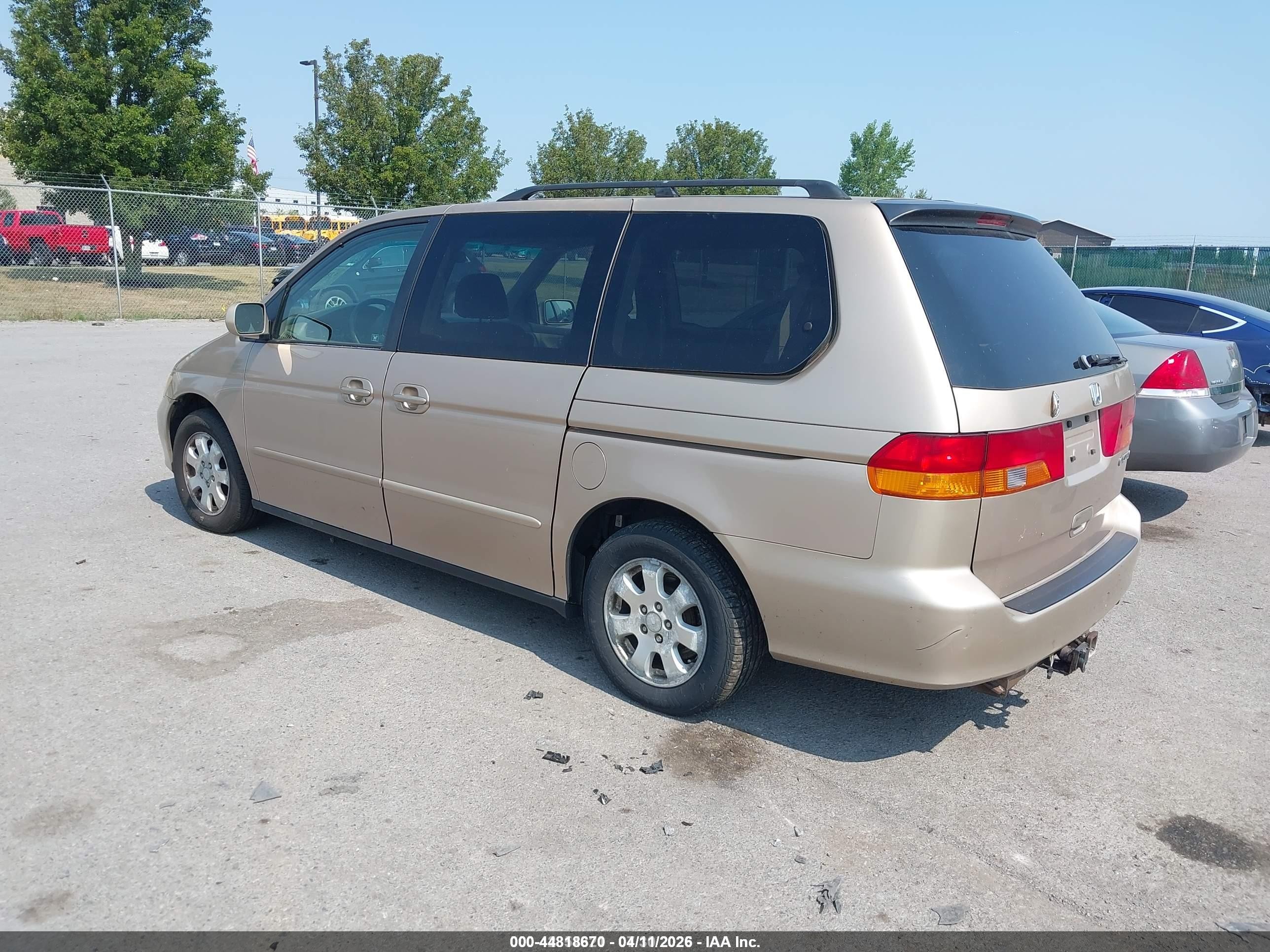 2002 Honda Odyssey Ex Gold vin: 2HKRL18652H522285