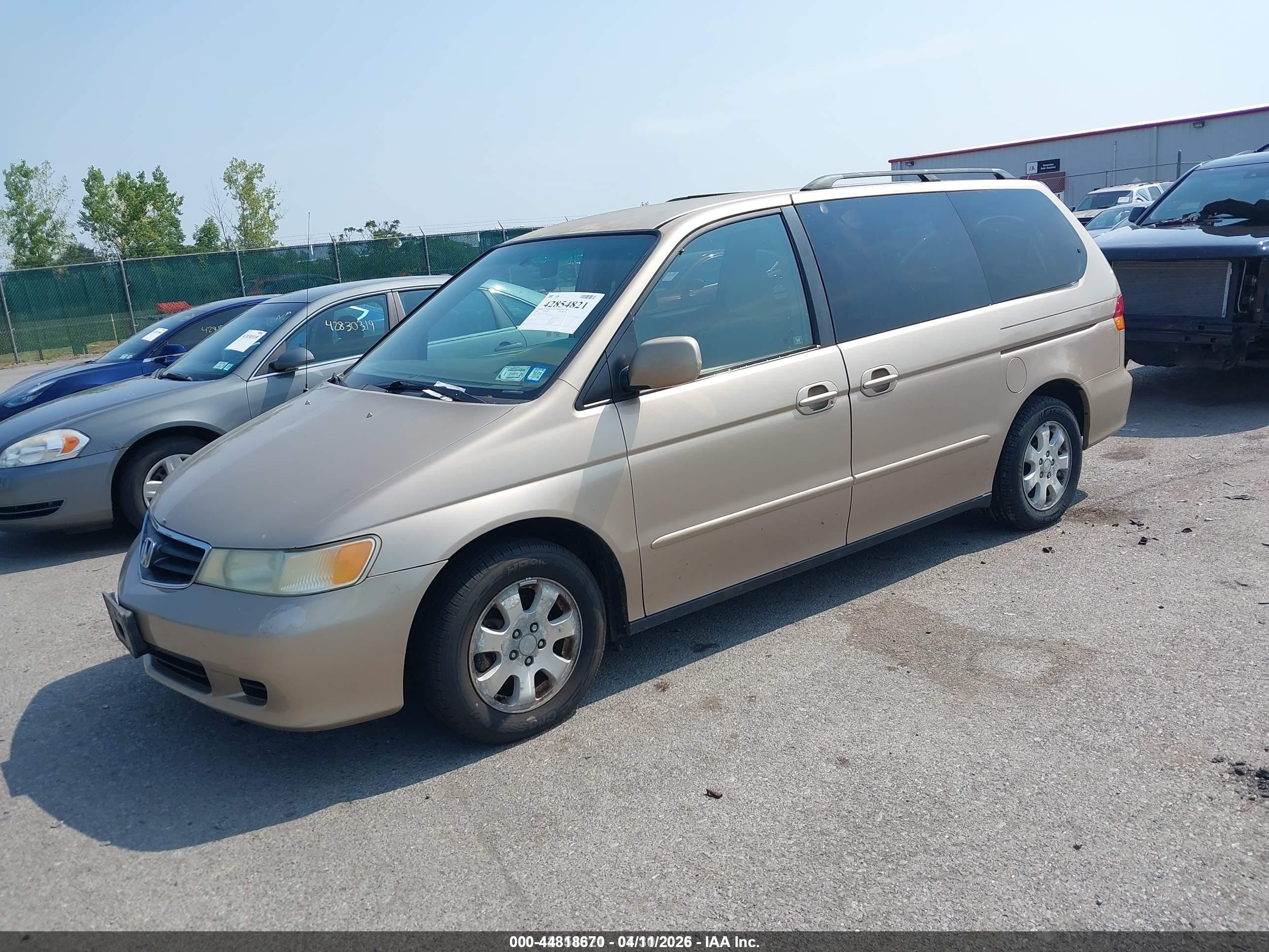2002 Honda Odyssey Ex Gold vin: 2HKRL18652H522285