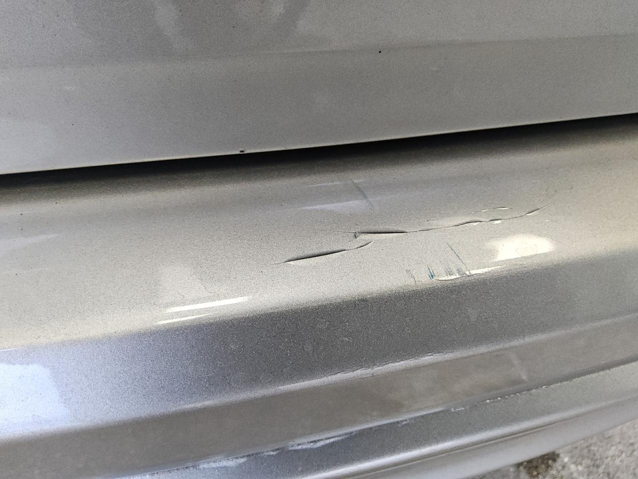 2015 Honda Cr-v Exl Silver vin: 2HKRM3H76FH500884 Damage: Rear Bumper, Peeling, 9 To 10 Inches