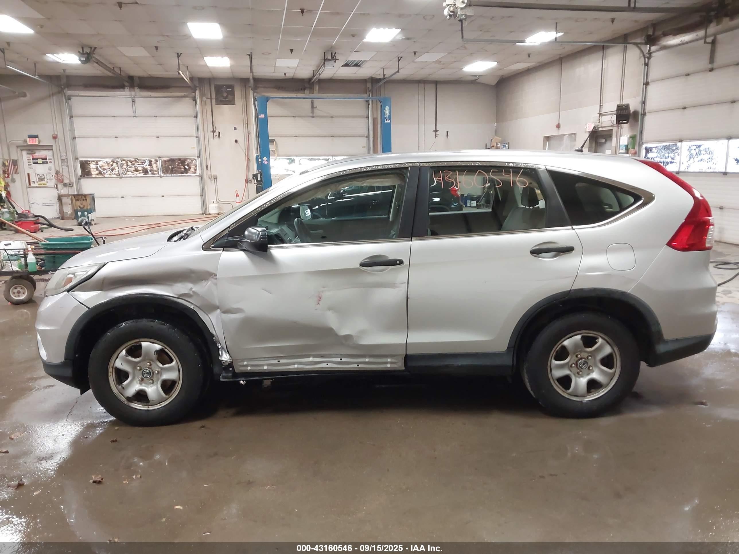 2015 Honda Cr-v Lx Silver vin: 2HKRM4H32FH641910