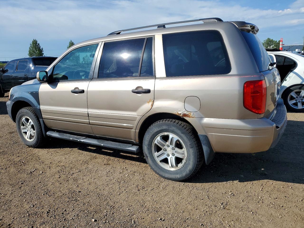 2004 Honda Pilot Ex Gold vin: 2HKYF18484H003929