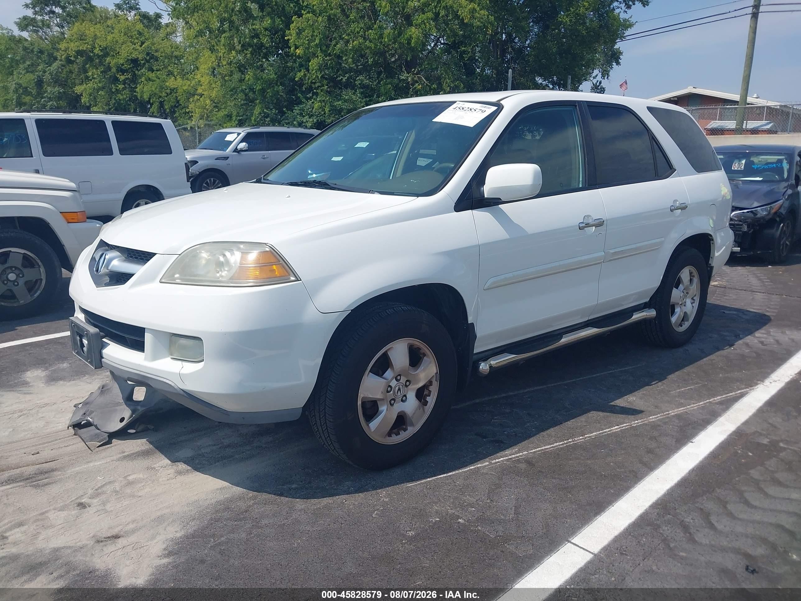 2005 Acura Mdx   White vin: 2HNYD18225H526808