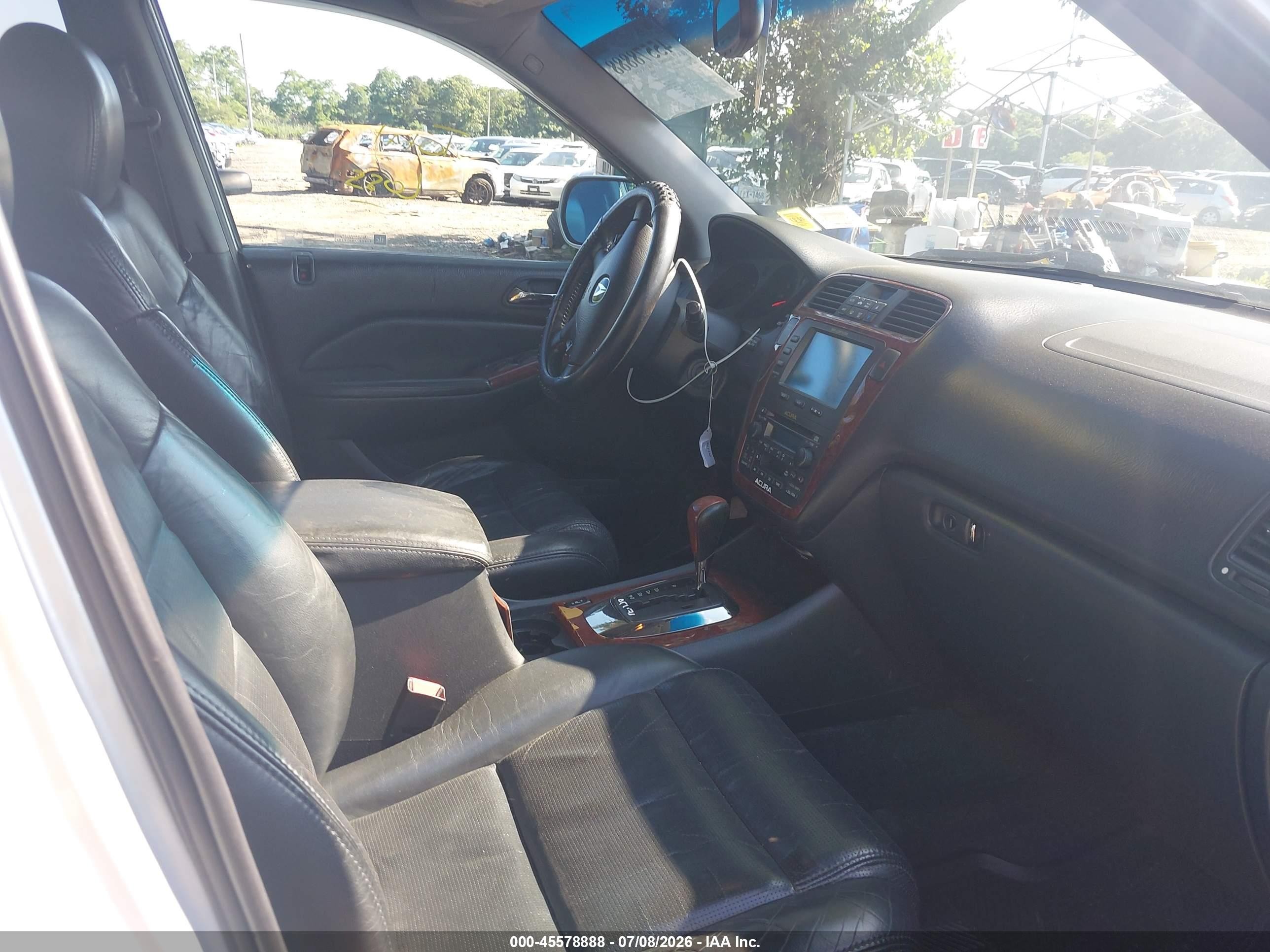 2004 Acura Mdx   Silver vin: 2HNYD18244H507191