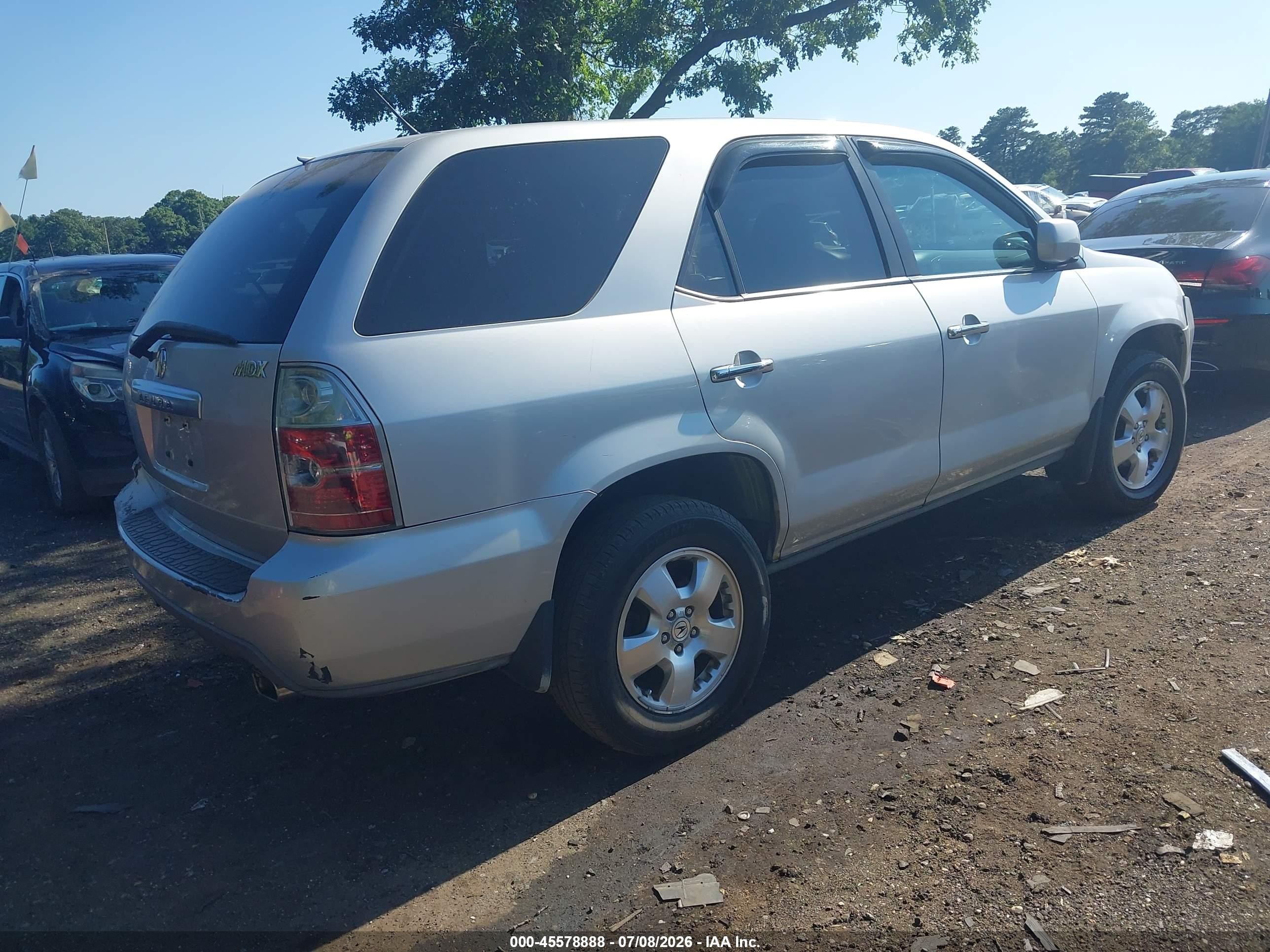 2004 Acura Mdx   Silver vin: 2HNYD18244H507191