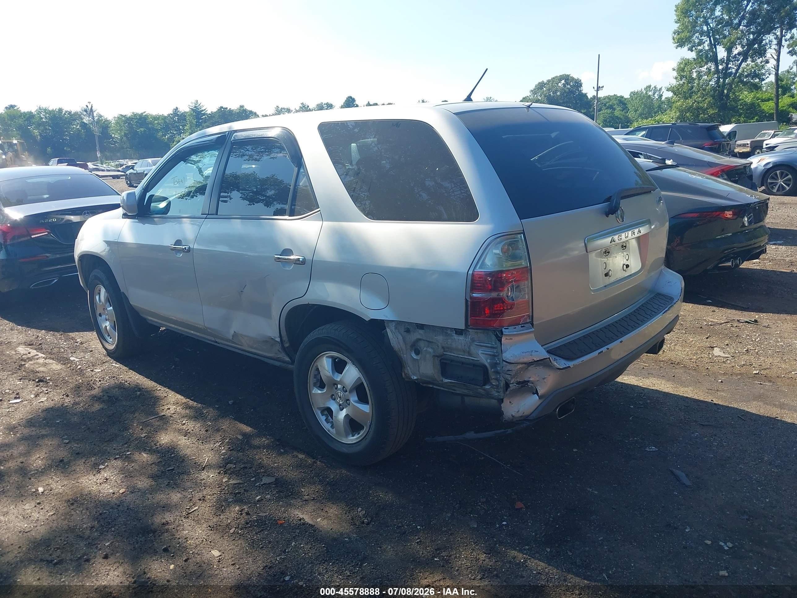 2004 Acura Mdx   Silver vin: 2HNYD18244H507191