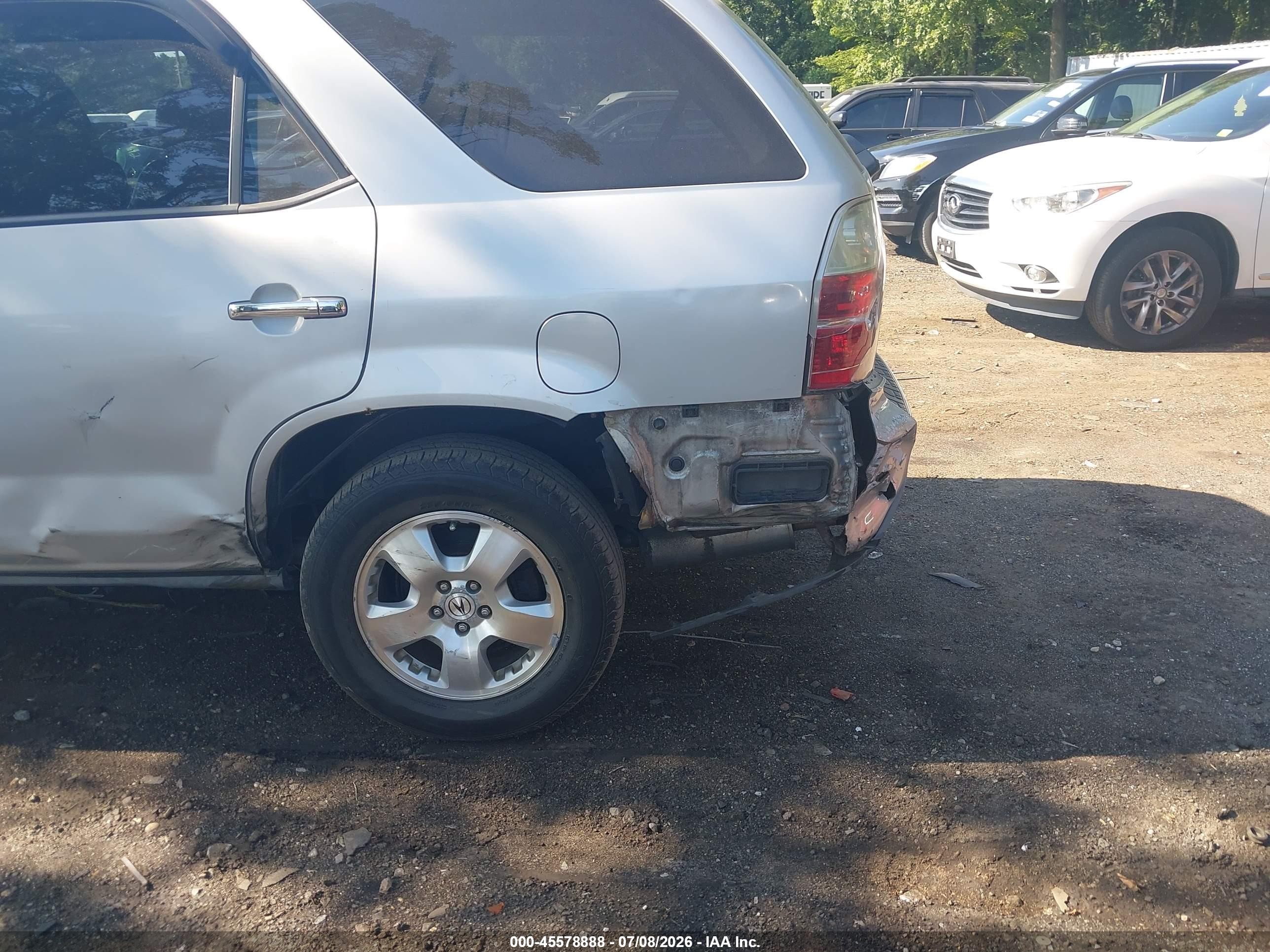 2004 Acura Mdx   Silver vin: 2HNYD18244H507191