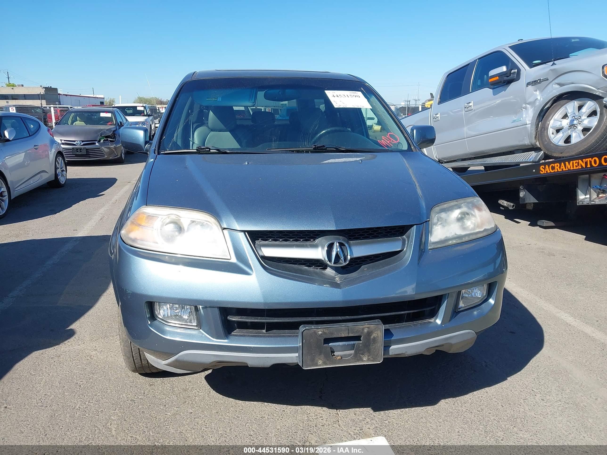 2006 Acura Mdx   Blue vin: 2HNYD18256H531759