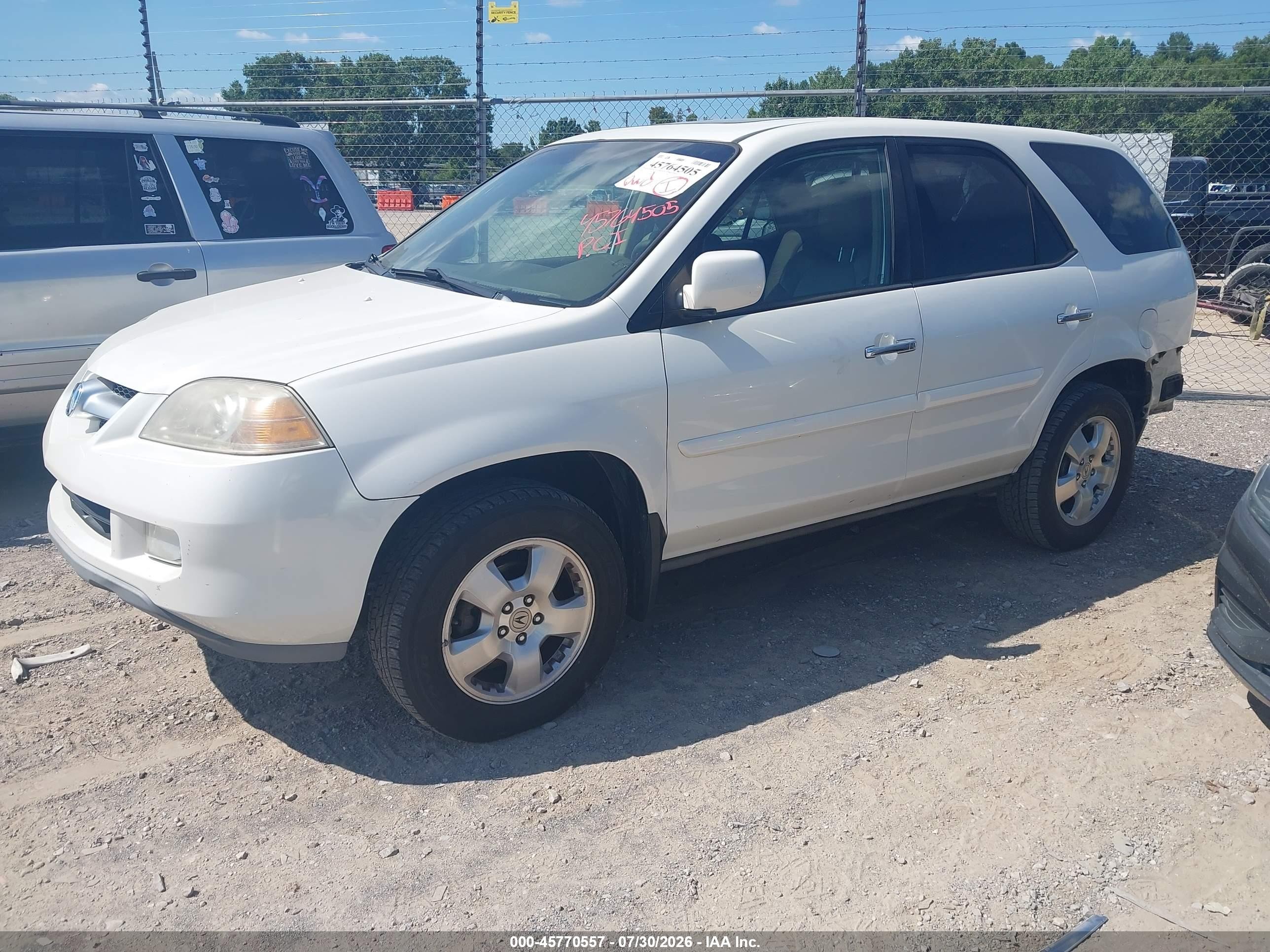 2006 Acura Mdx   White vin: 2HNYD18256H550358