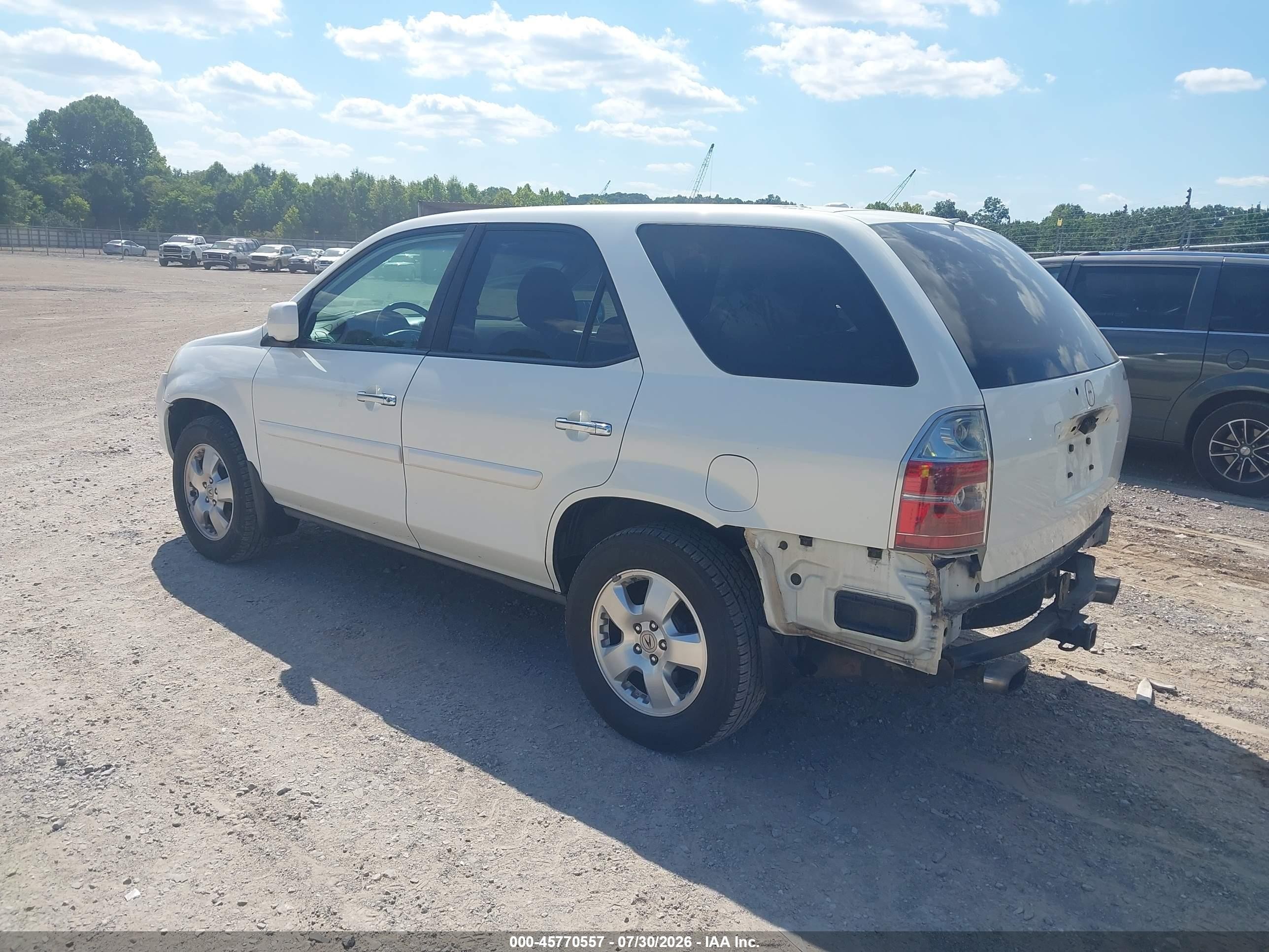 2006 Acura Mdx   White vin: 2HNYD18256H550358
