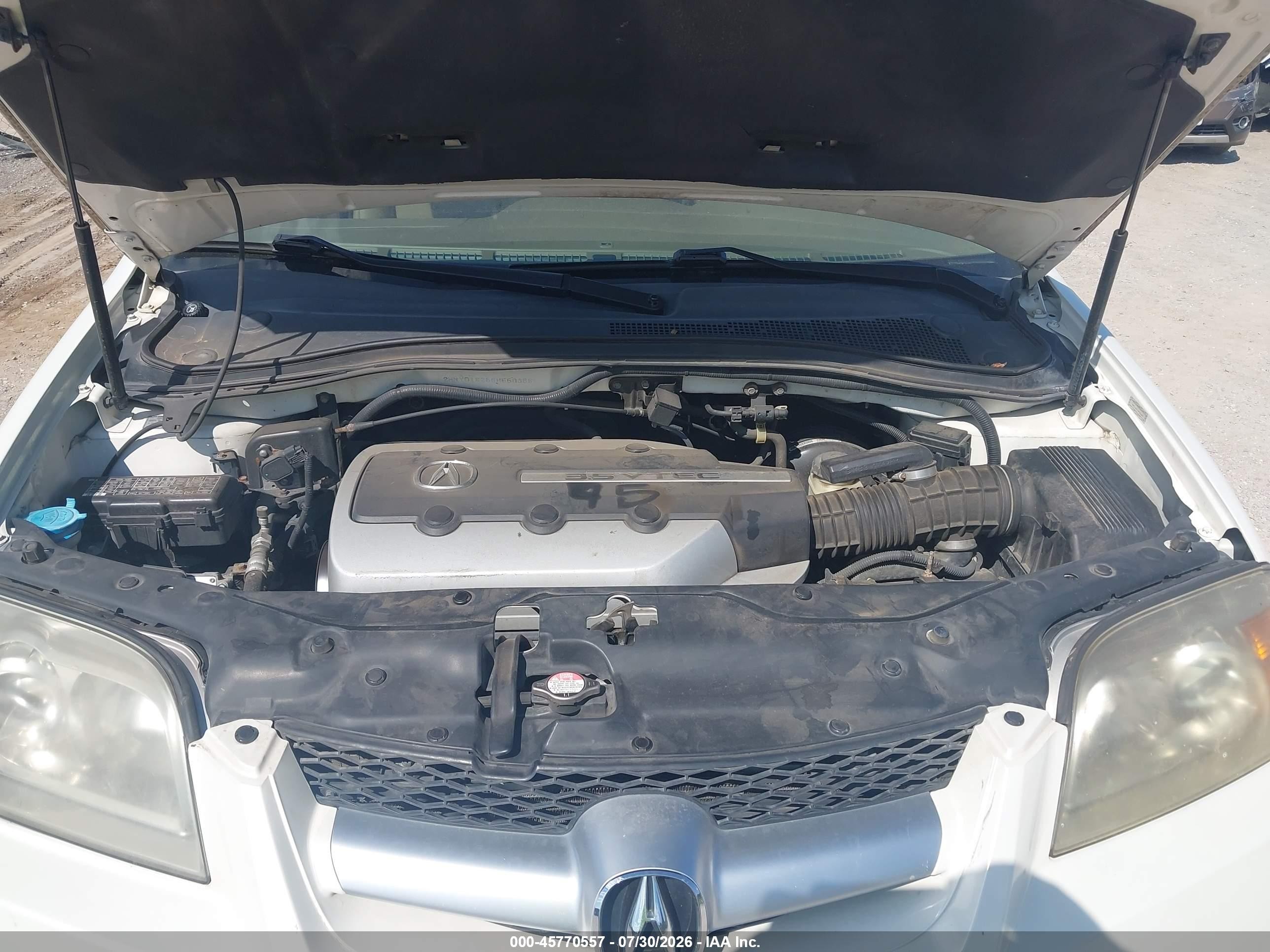 2006 Acura Mdx   White vin: 2HNYD18256H550358