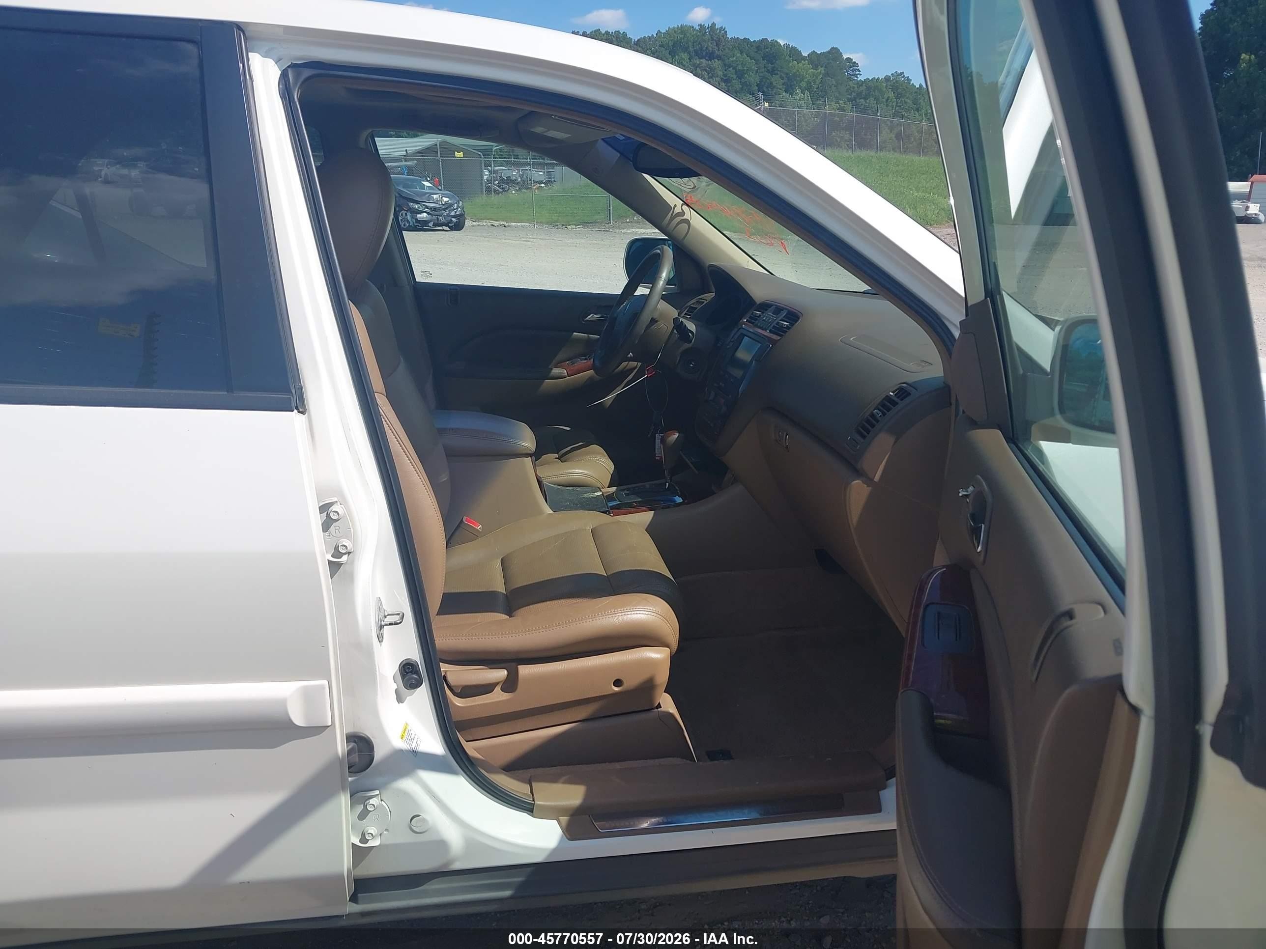 2006 Acura Mdx   White vin: 2HNYD18256H550358